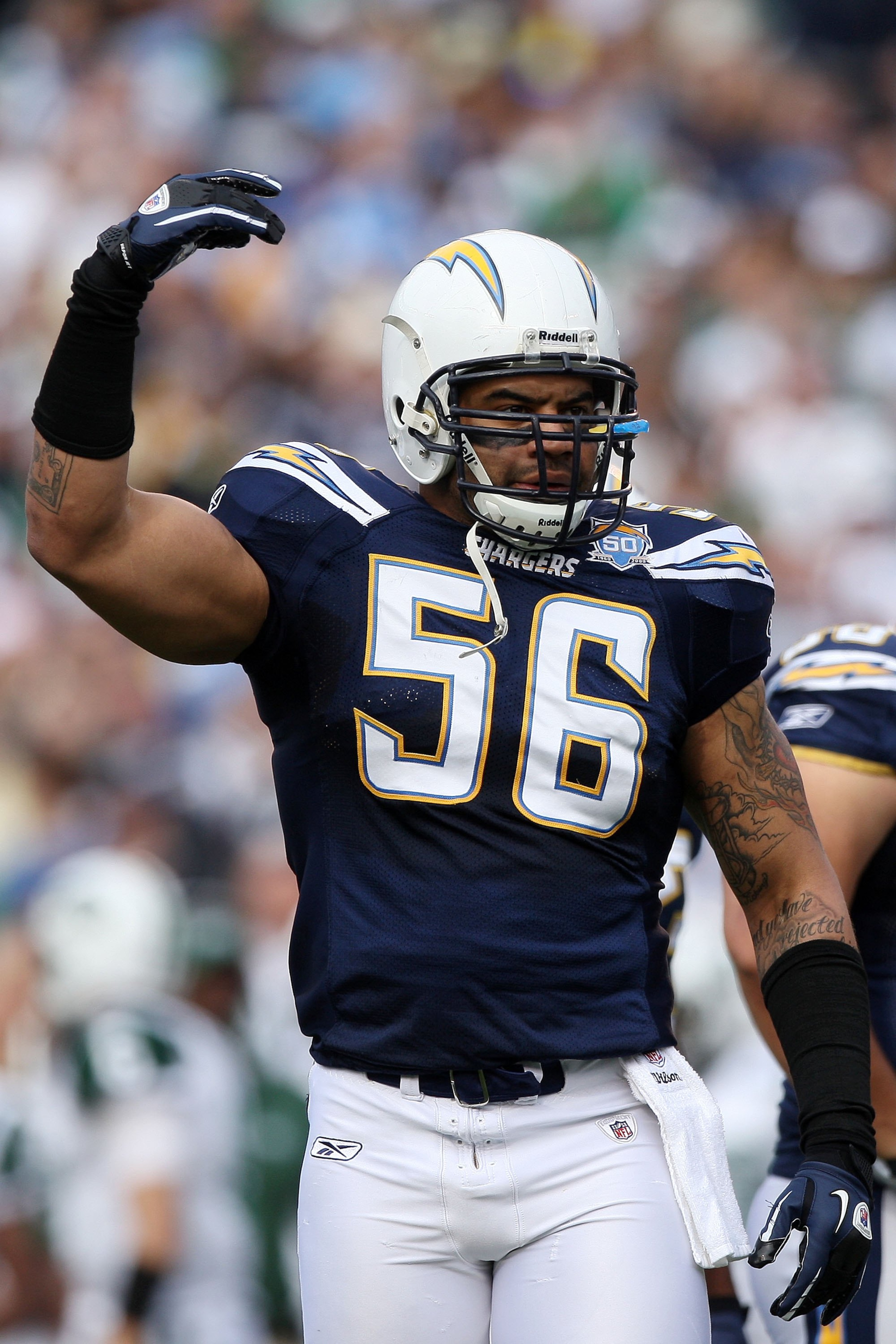 SAN DIEGO - JANUARY 17:  Linebacker Shawne Merriman #56 of the San Diego Chargers signals on the field during the AFC Divisional Playoff Game against the New York Jets at Qualcomm Stadium on January 17, 2010 in San Diego, California.  (Photo by Donald Mir