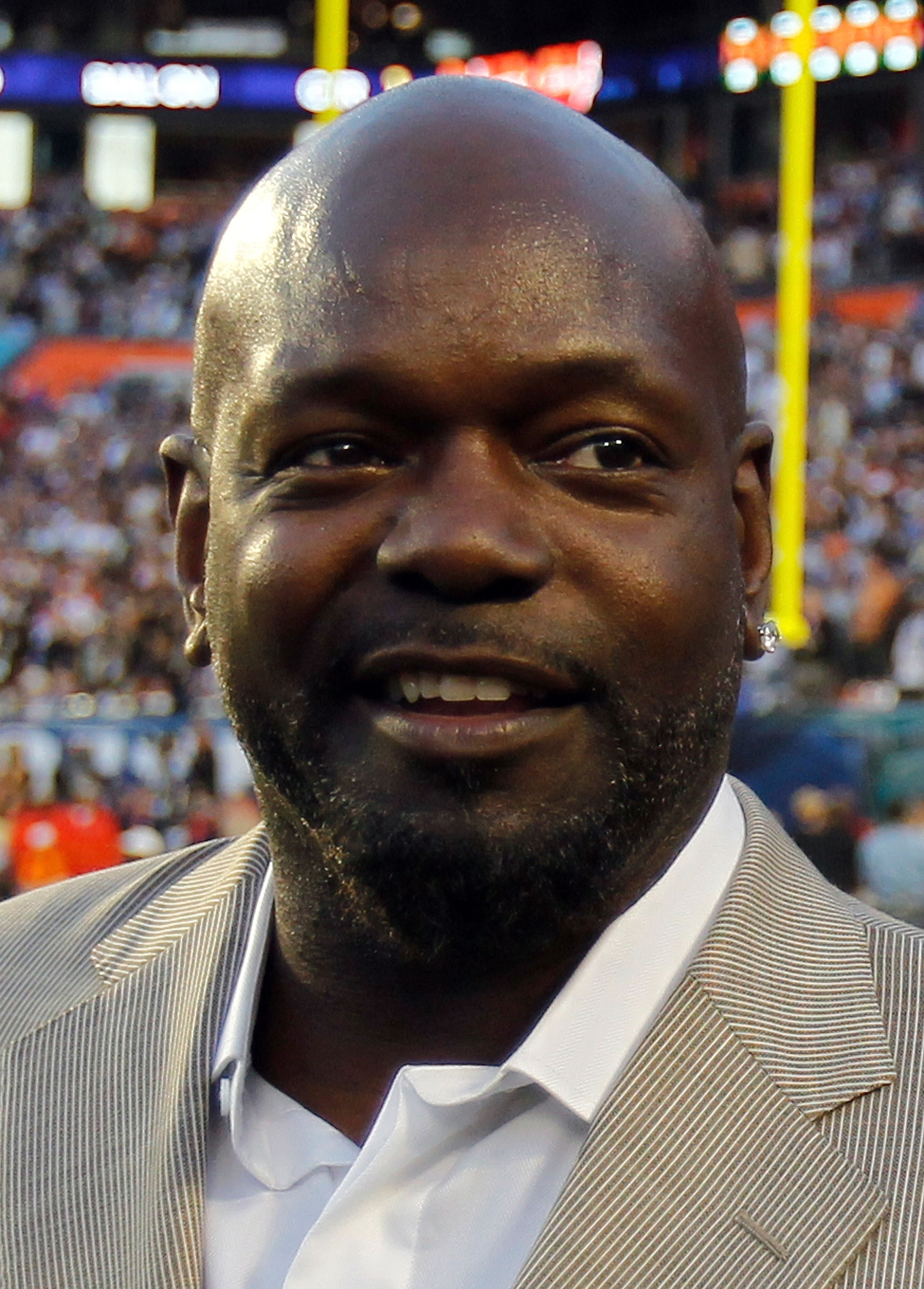 MIAMI GARDENS, FL - FEBRUARY 07:  NFL Hall of Famer Emmitt Smith is seen on the field prior to Super Bowl XLIV between the Indianapolis Colts and the New Orleans Saints on February 7, 2010 at Sun Life Stadium in Miami Gardens, Florida.  (Photo by Jonathan