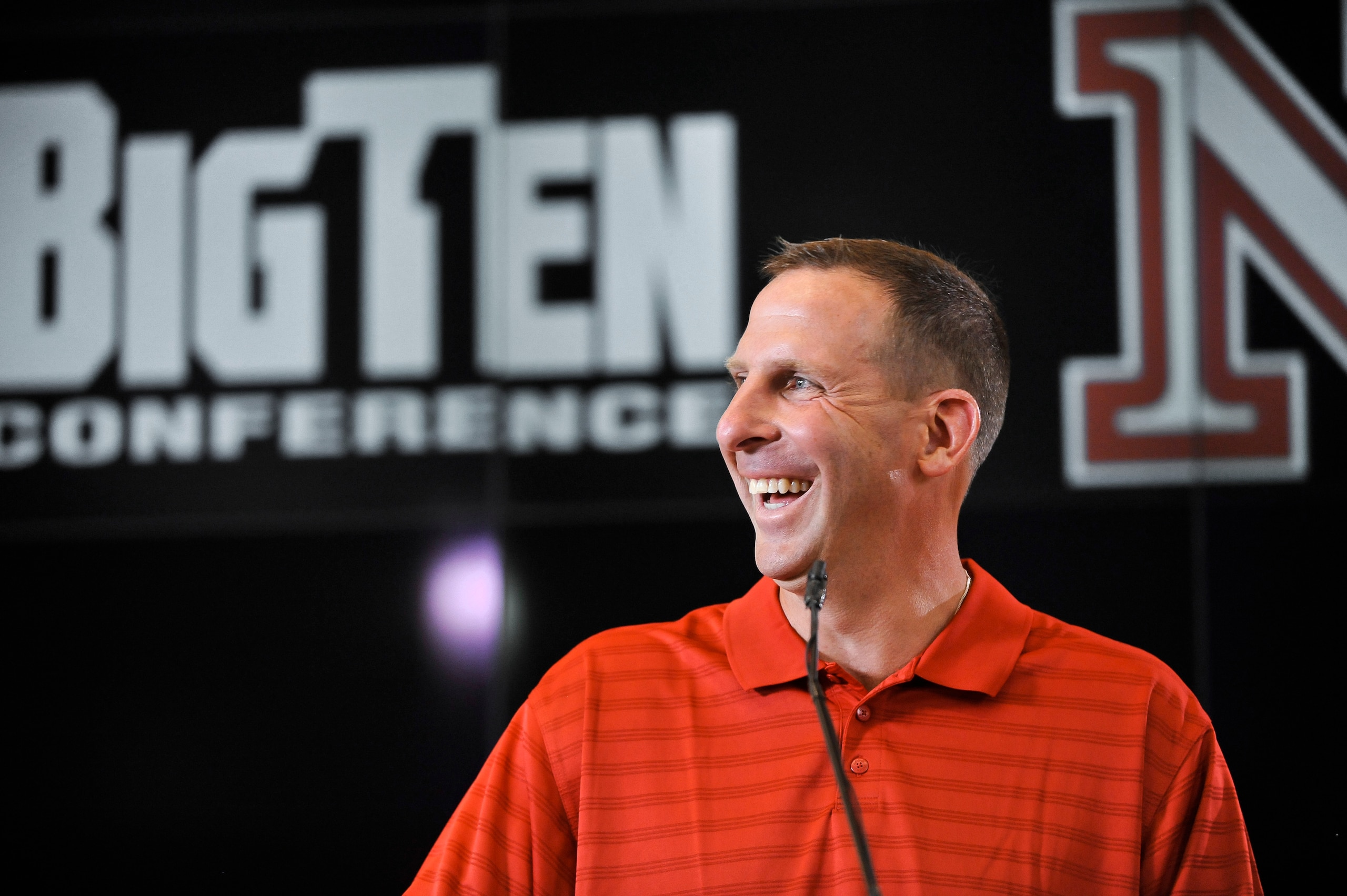 LINCOLN, NE - JUNE 11: University of Nebraska football coach Bo Pelini jokes with members of the media at a press conference announcing Nebraska accepting an invitation to join the Big Ten Conference June 11, 2010 in Lincoln, Nebraska. The university w LINCOLN, NE - JUNE 11: University of Nebraska football coach Bo Pelini jokes with members of the media at a press conference announcing Nebraska accepting an invitation to join the Big Ten Conference June 11, 2010 in Lincoln, Nebraska. The university w
