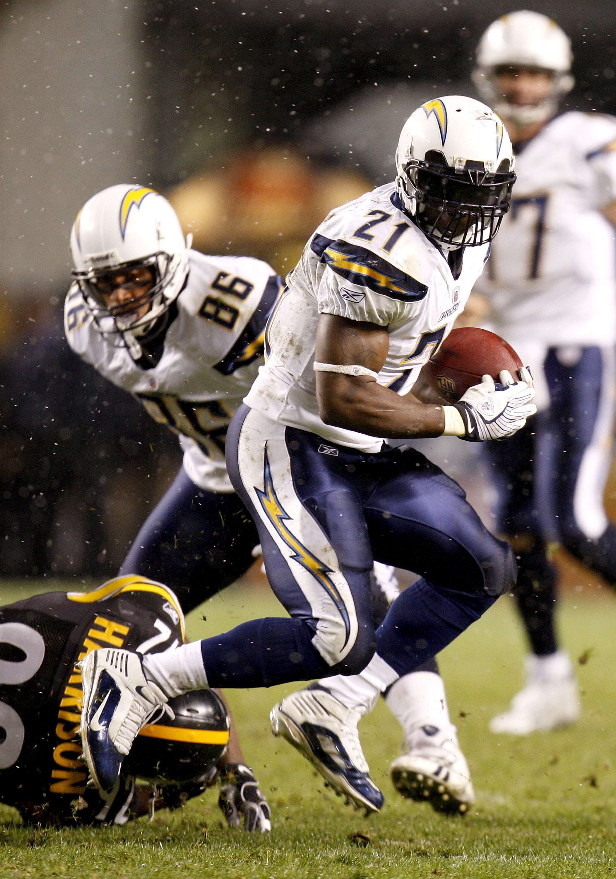 PITTSBURGH - NOVEMBER 16: LaDanian Tomlinson #21 of the San Diego Chargers looks for exta yards after getting past James Harrison #92 of the Pittsburgh Steelers during the second quarter on November 16, 2008 at Heinz Field in Pittsburgh, Pennsylvania.  (P