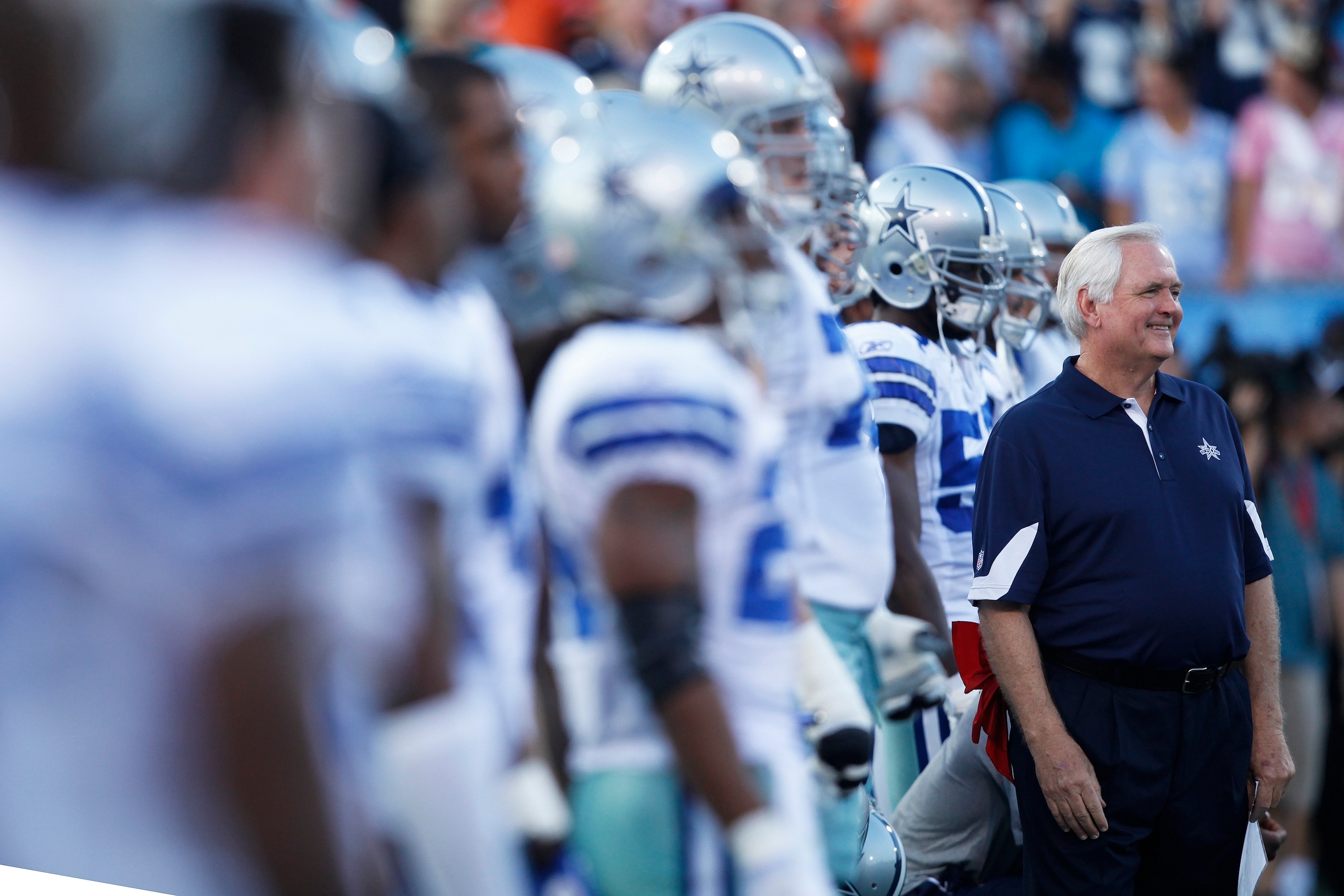 CANTON, OH - AUGUST 8: Head coach Wade Phillips of the Dallas Cowboys stands near his team before the game against the Cincinnati Bengals during the 2010 Pro Football Hall of Fame Game at the Pro Football Hall of Fame Field at Fawcett Stadium on August 8,