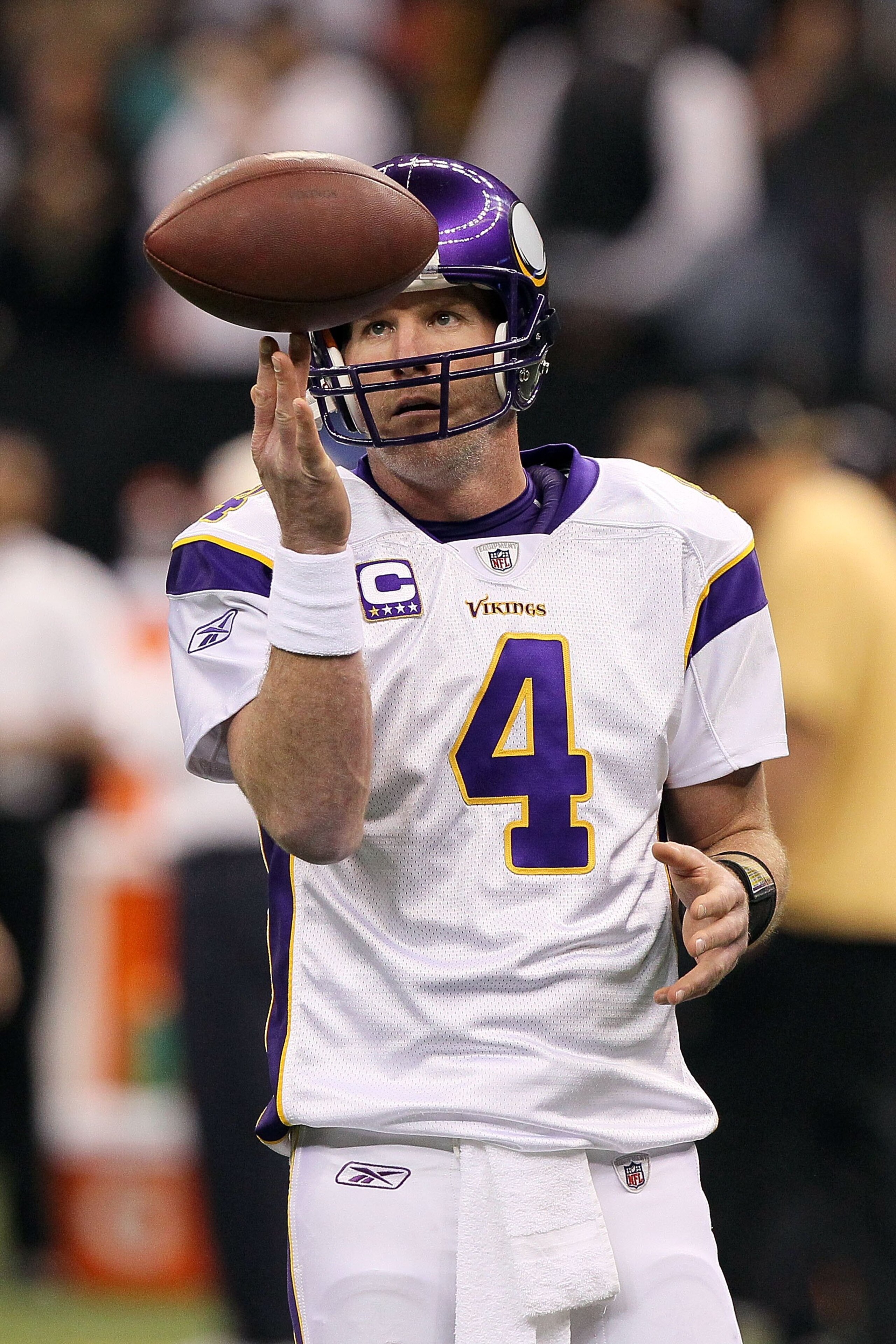 NEW ORLEANS - JANUARY 24:  Brett Favre #4 of the Minnesota Vikings warms up against the New Orleans Saints during the NFC Championship Game at the Louisiana Superdome on January 24, 2010 in New Orleans, Louisiana. The Saints won 31-28 in overtime.  (Photo