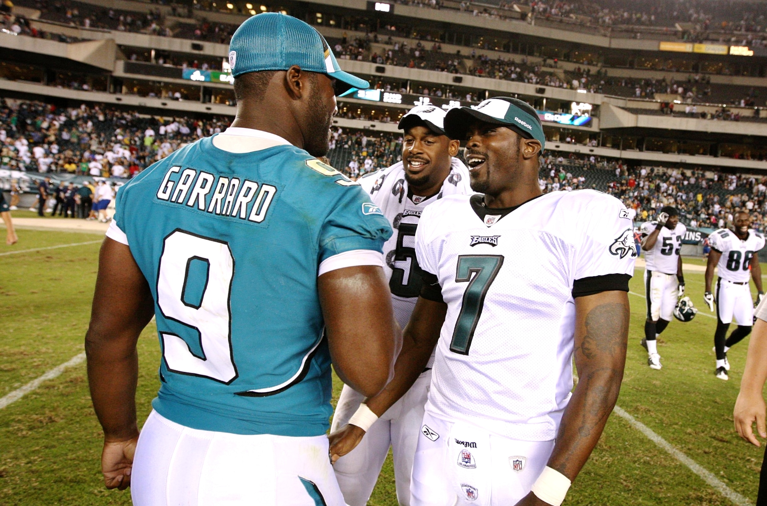 PHILADELPHIA, PA - AUGUST 27:  David Garrard #9 of the Jacksonville Jaguars greets Donovan McNabb #5 and Michael Vick #7 of the Philadelphia Eagles after the Eagles win in the preseason game at Lincoln Financial Field on August 27, 2009 in Philadelphia, P