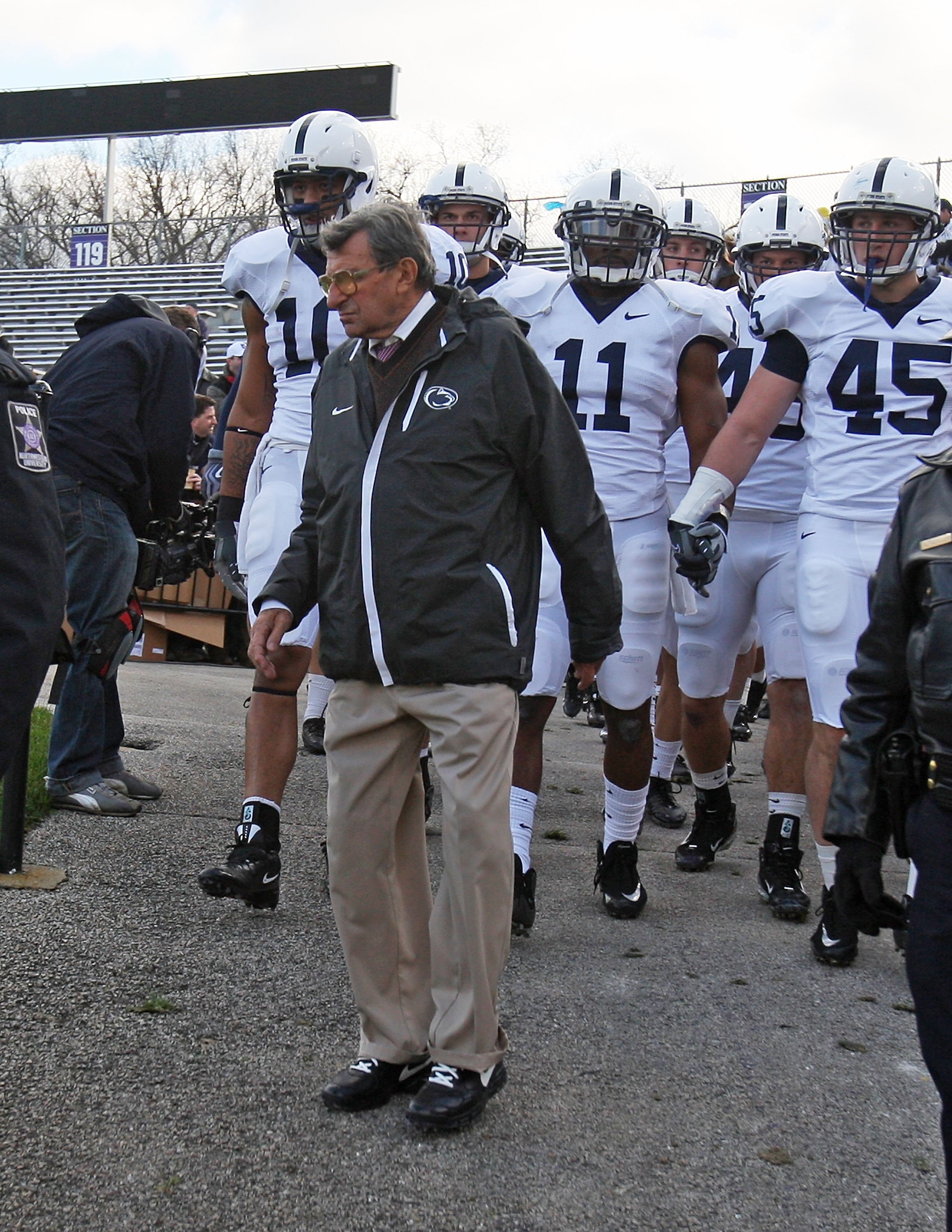 EVANSTON, IL - OCTOBER 31: Head coach Joe Paterno of the Penn State Nittany Lions walks onto the field with his team before a game against the Northwestern Wildcats at Ryan Field on October 31, 2009 in Evanston, Illinois. Penn State defeated Northwestern