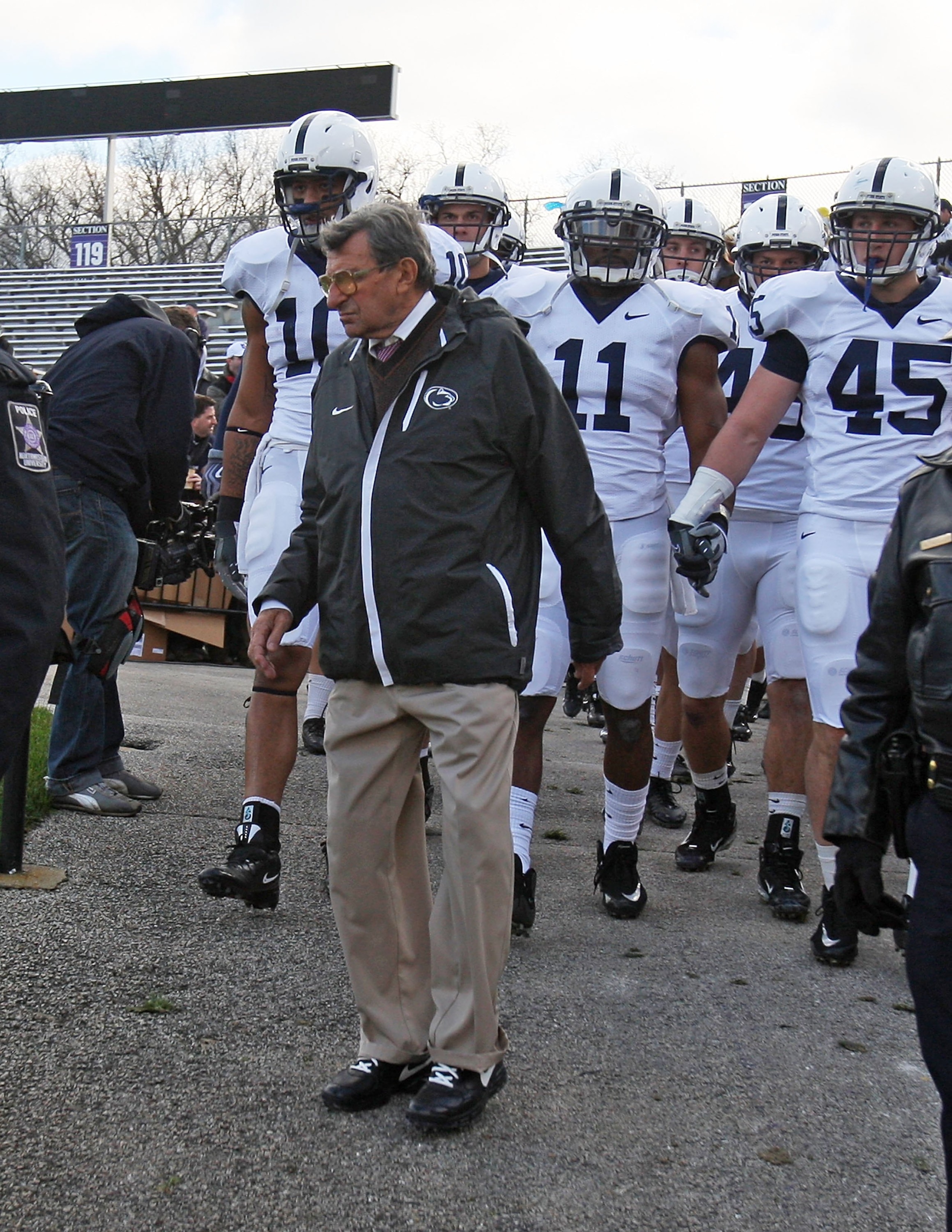 EVANSTON, IL - OCTOBER 31: Head coach Joe Paterno of the Penn State Nittany Lions walks onto the field with his team before a game against the Northwestern Wildcats at Ryan Field on October 31, 2009 in Evanston, Illinois. Penn State defeated Northwestern