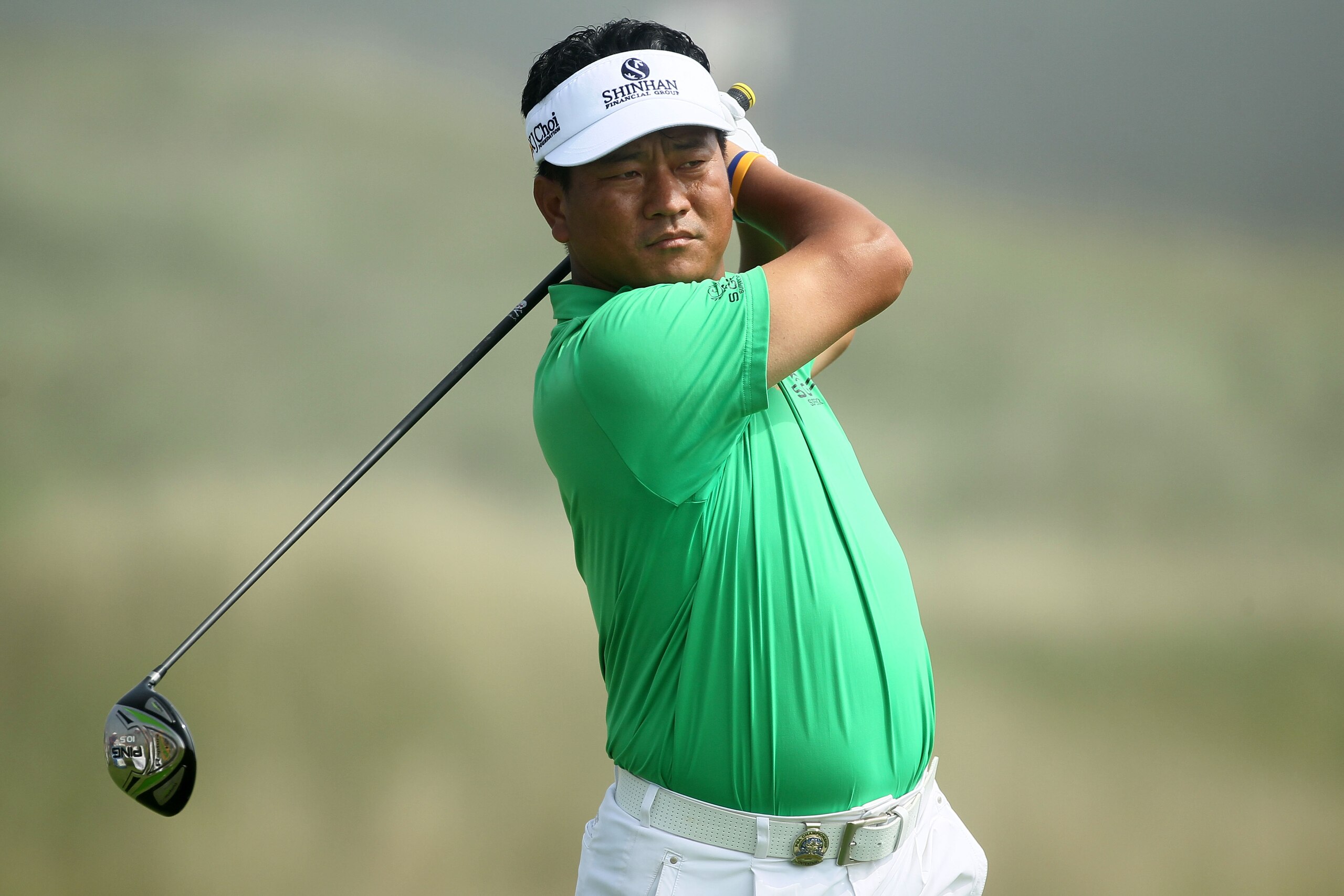 KOHLER, WI - AUGUST 12:  K.J. Choi of South Korea watches his tee shot on the second hole during the first round of the 92nd PGA Championship on the Straits Course at Whistling Straits on August 12, 2010 in Kohler, Wisconsin.  (Photo by Andy Lyons/Getty I