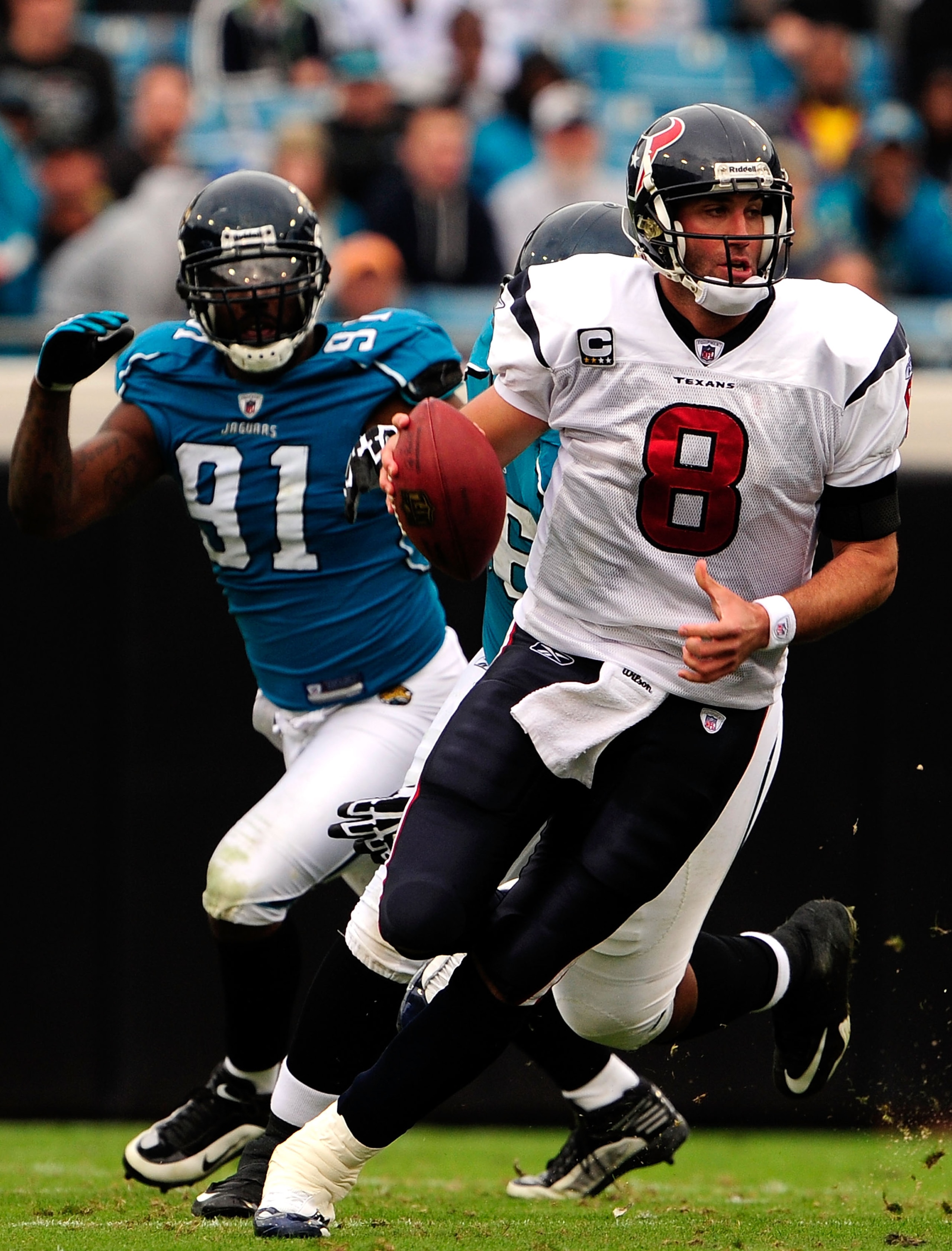 JACKSONVILLE, FL - DECEMBER 06:  Derrick Harvey #91 of the Jacksonville Jaguars pressures Matt Schaub #8 of the Houston Texnas during the game at Jacksonville Municipal Stadium on December 6, 2009 in Jacksonville, Florida.  (Photo by Sam Greenwood/Getty I