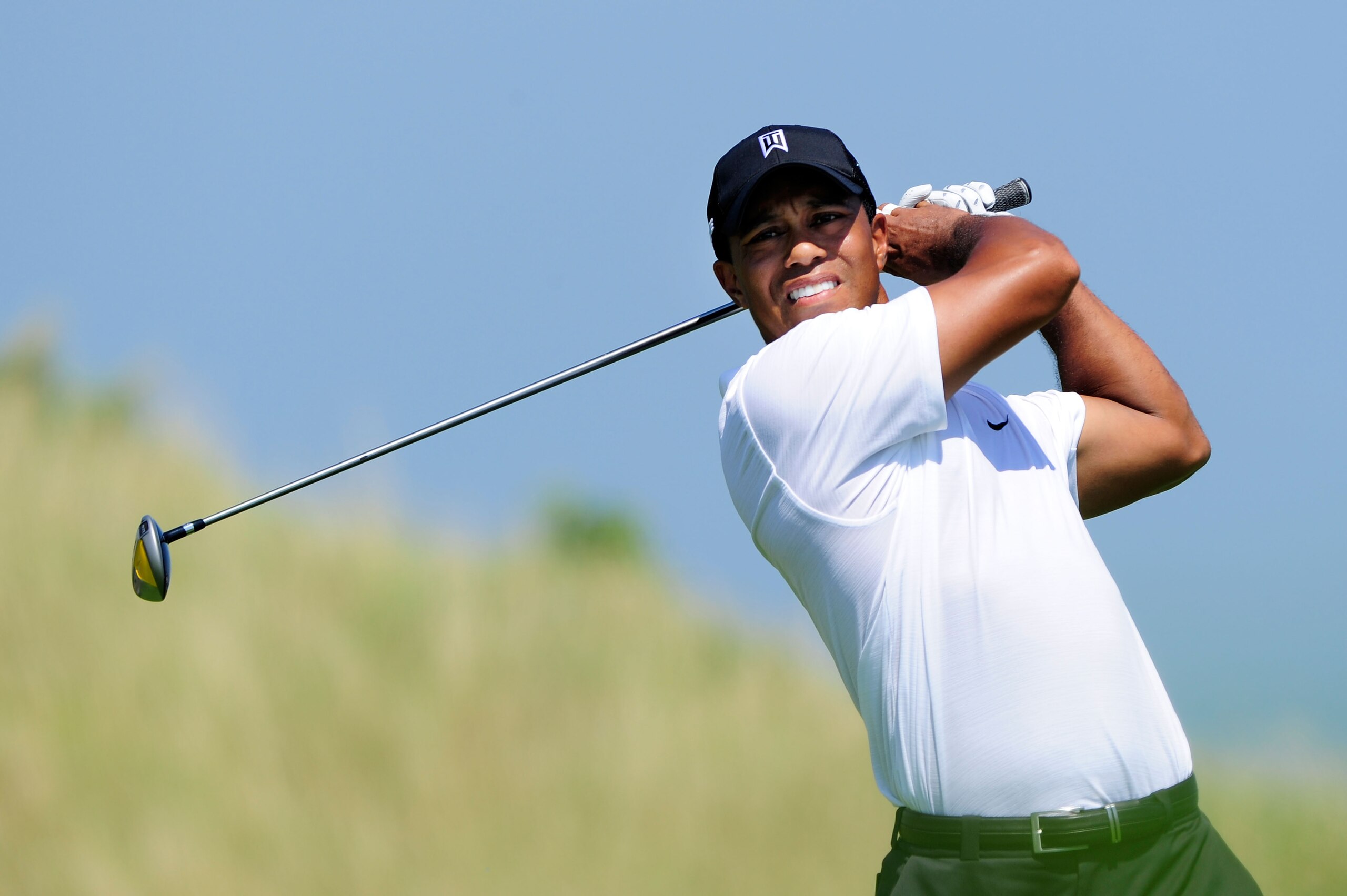 KOHLER, WI - AUGUST 12:  Tiger Woods watches his tee shot on the 14th hole during the first round of the 92nd PGA Championship on the Straits Course at Whistling Straits on August 12, 2010 in Kohler, Wisconsin.  (Photo by Stuart Franklin/Getty Images)