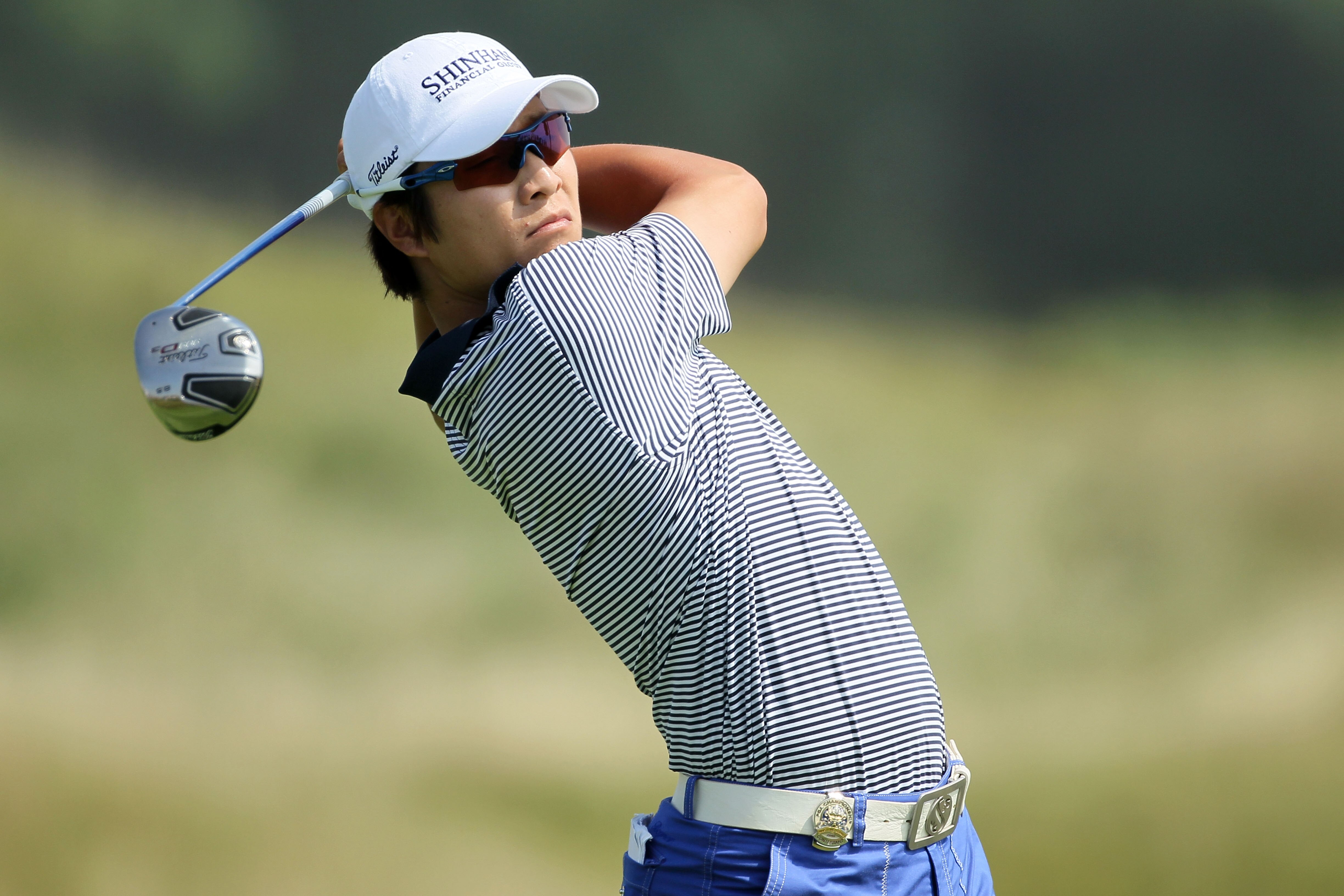 KOHLER, WI - AUGUST 12:  Kyung-Tae Kim of South Korea hits a tee shot on the second hole during the first round of the 92nd PGA Championship on the Straits Course at Whistling Straits on August 12, 2010 in Kohler, Wisconsin.  (Photo by Andy Lyons/Getty Im