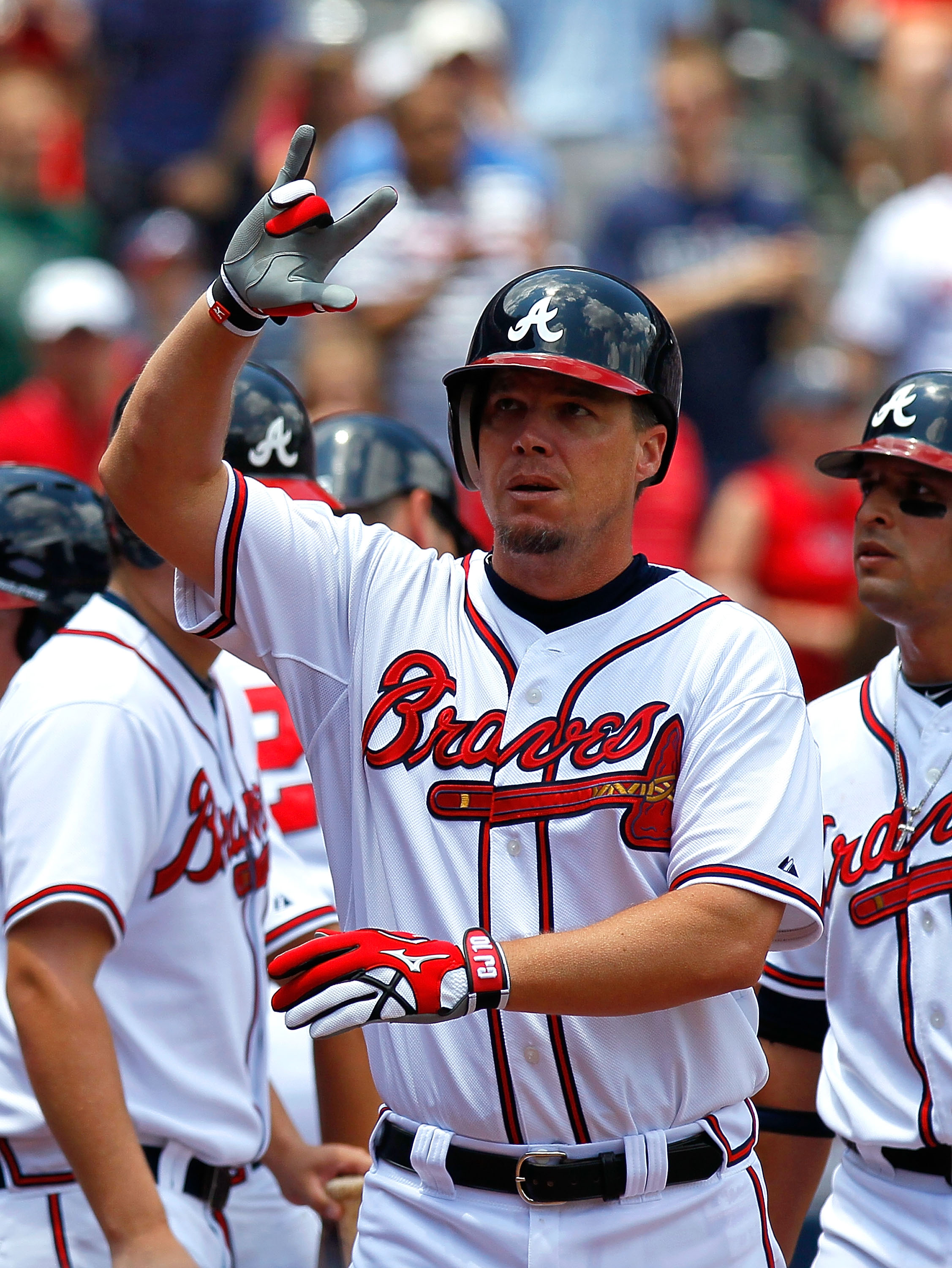 ATLANTA - MAY 31:  Chipper Jones #10 of the Atlanta Braves reacts after hitting a two-run homer in the first inning against the Philadelphia Phillies at Turner Field on May 31, 2010 in Atlanta, Georgia.  (Photo by Kevin C. Cox/Getty Images)