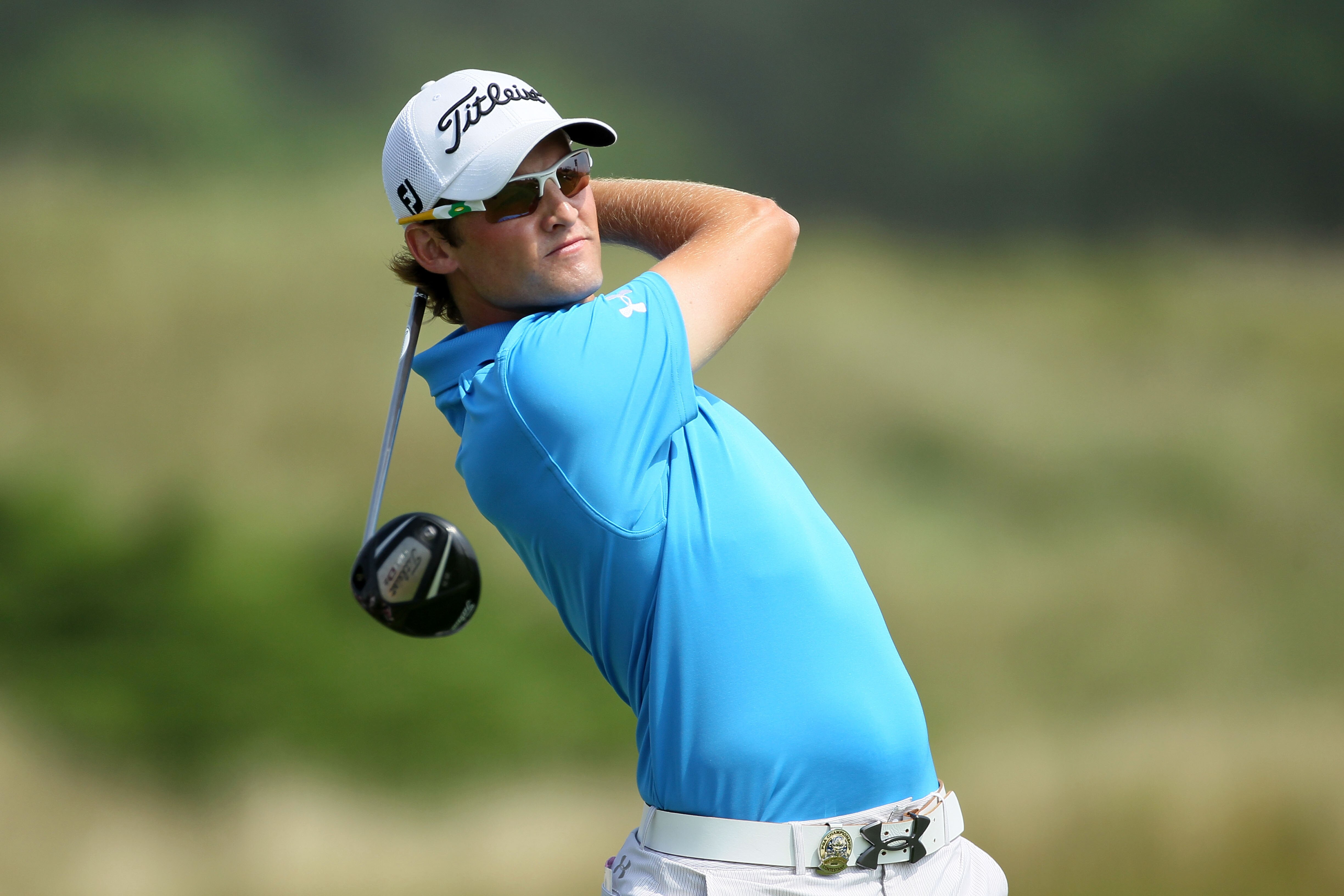 KOHLER, WI - AUGUST 12:  Michael Sim of Australia watches his tee shot on the second hole during the first round of the 92nd PGA Championship on the Straits Course at Whistling Straits on August 12, 2010 in Kohler, Wisconsin.  (Photo by Andy Lyons/Getty I