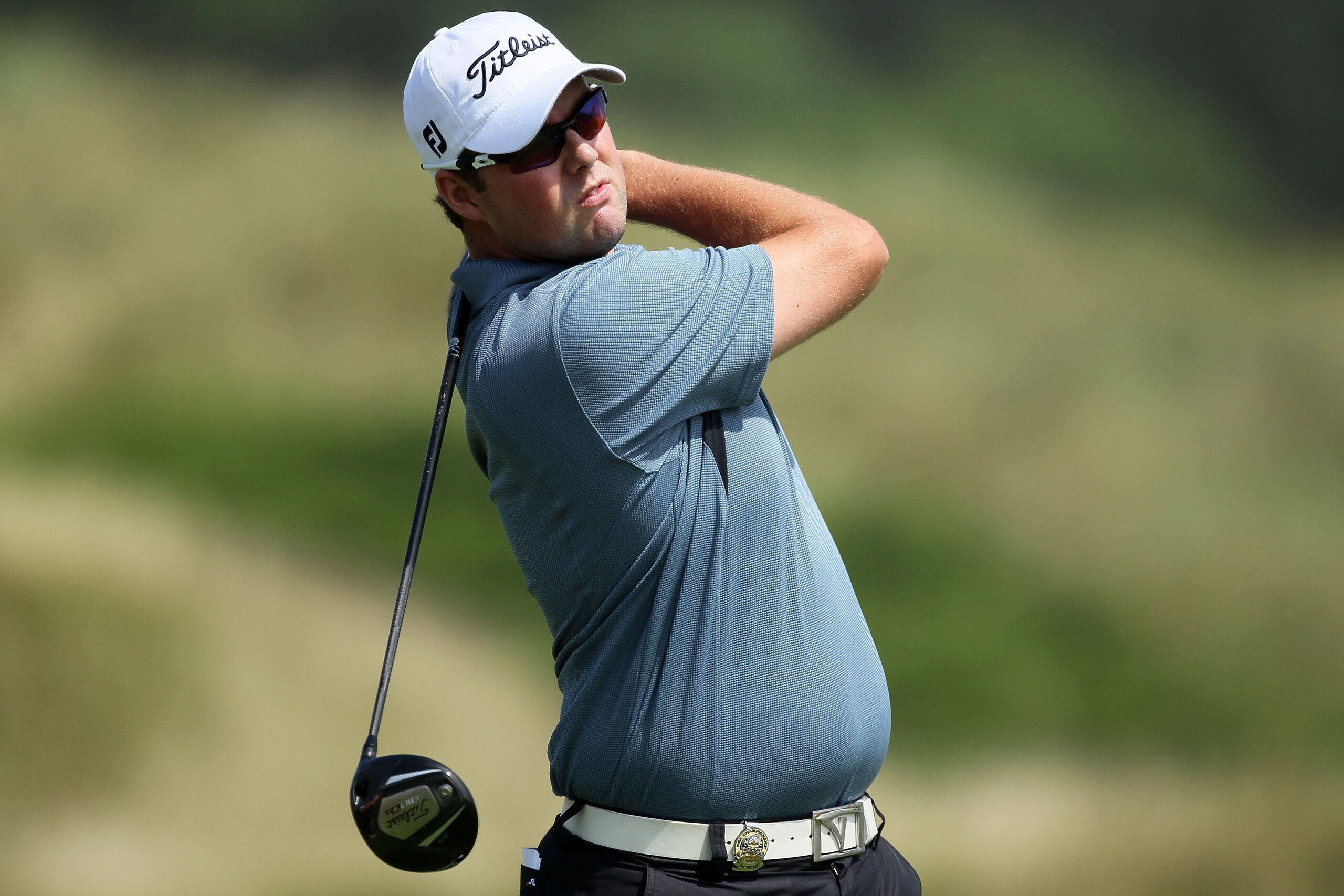 KOHLER, WI - AUGUST 12:  Marc Leishman of Australia watches his tee shot on the second hole during the first round of the 92nd PGA Championship on the Straits Course at Whistling Straits on August 12, 2010 in Kohler, Wisconsin.  (Photo by Andy Lyons/Getty