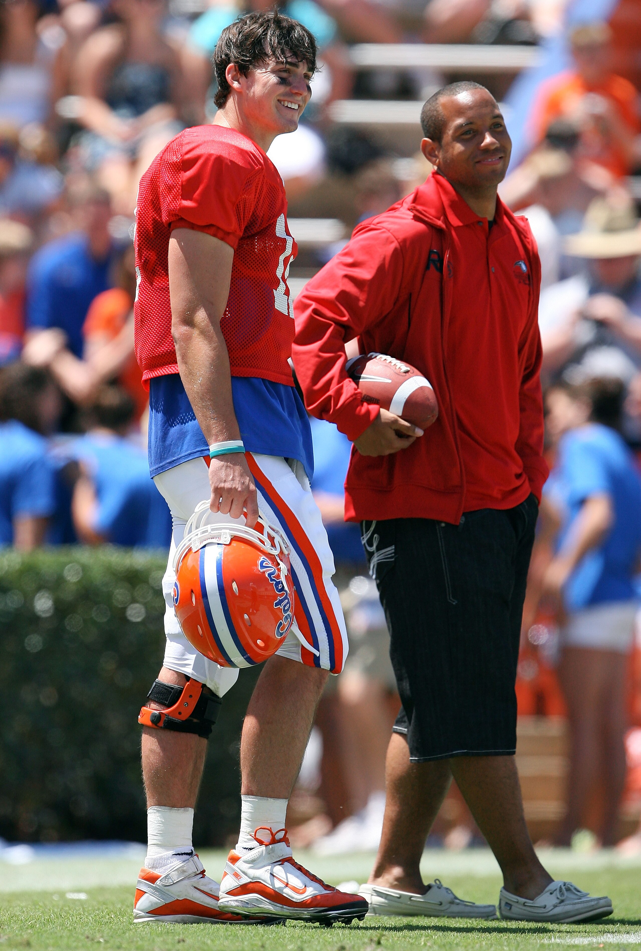 GAINESVILLE, FL - APRIL 10:  Quarterback John Brantley #12 of the Florida Gators stands with former Gator quarterback Chris Leak during the Orange & Blue game at Ben Hill Griffin Stadium on April 10, 2010 in Gainesville, Florida.  (Photo by Doug Benc/Gett