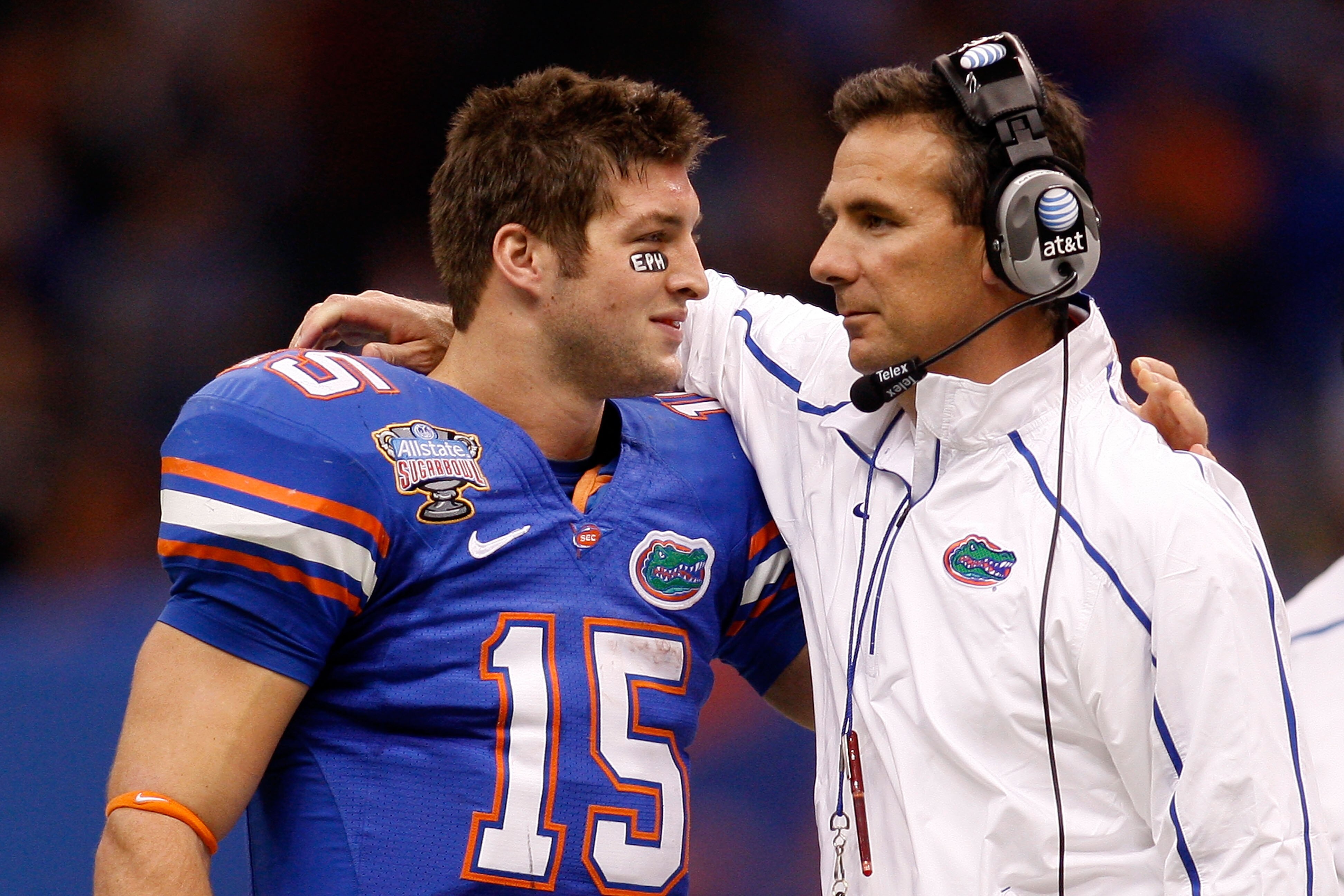 NEW ORLEANS - JANUARY 01:  Tim Tebow #15 of the Florida Gators hugs his head coach Urban Meyer after scoring a touchdown against the Cincinnati Bearcats during the Allstate Sugar Bowl at the Louisana Superdome on January 1, 2010 in New Orleans, Louisiana.