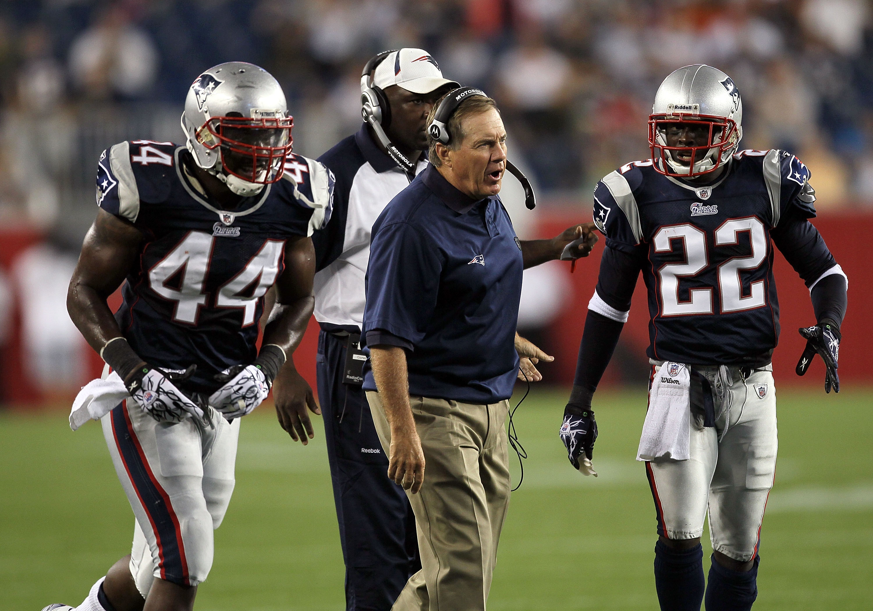 FOXBORO, MA - AUGUST 12: Coach Bill Belichick yells instructions to Tyrone McKenzie # 44 and Terrence Wheatley # 22 of the New England Patriots during a preseason game against the New Orleans Saints at Gillette Stadium on August 12, 2010 in Foxboro, Massa