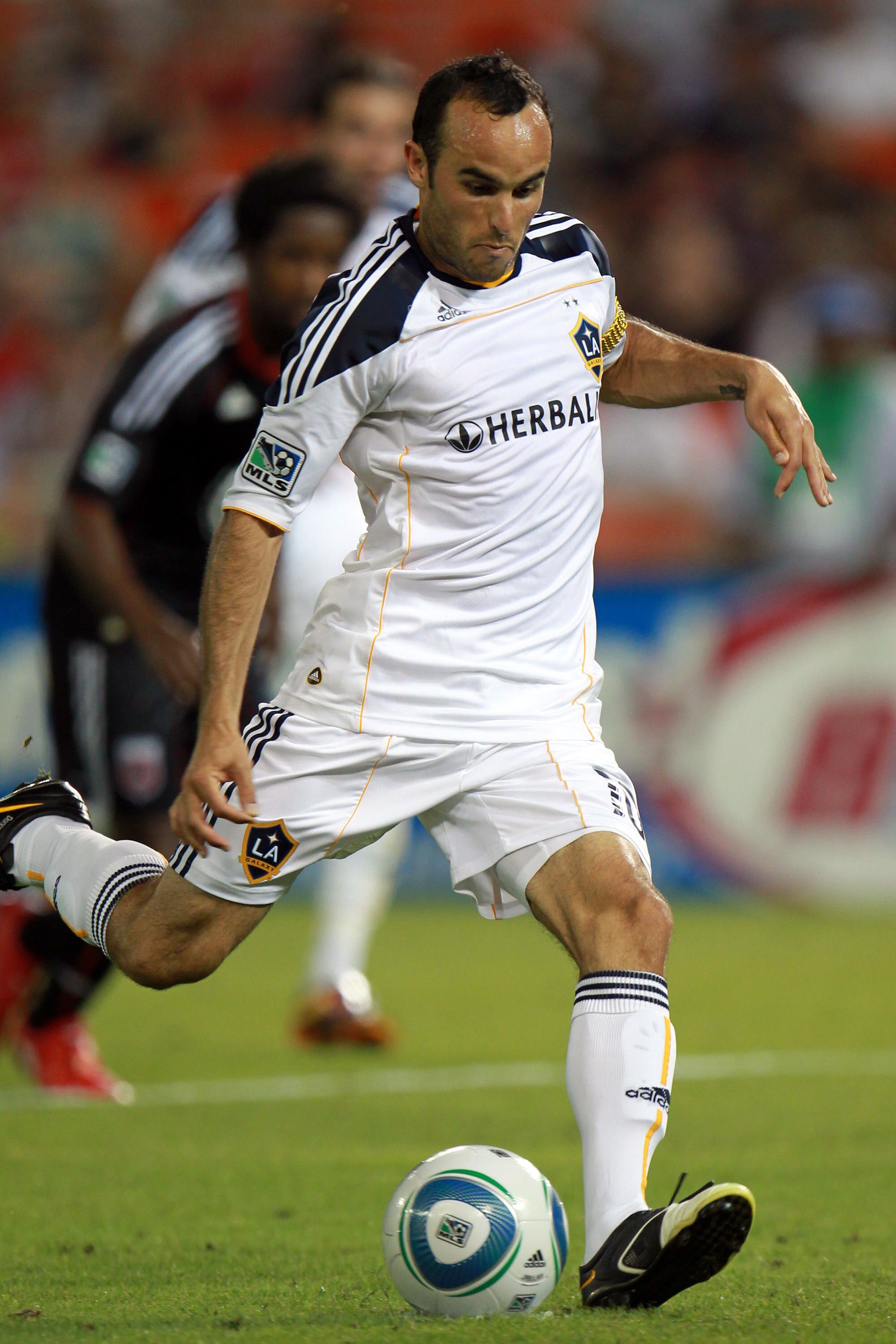 WASHINGTON - JULY 18: Landon Donovan #10 of the Los Angeles Galaxy converts a penalty kick against D.C. United at RFK Stadium on July 18, 2010 in Washington, DC. (Photo by Ned Dishman/Getty Images)