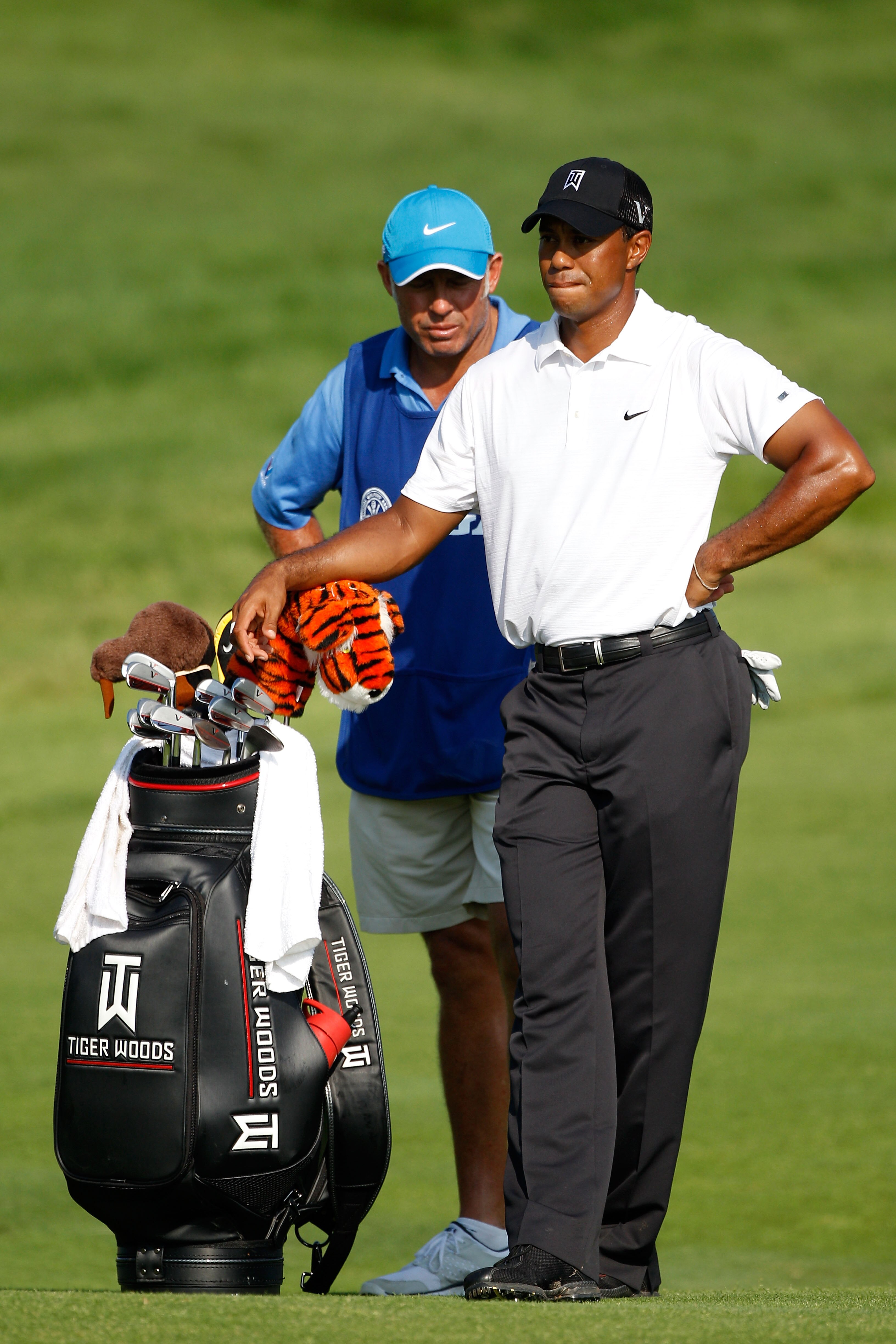 KOHLER, WI - AUGUST 12:  Tiger Woods waits with his caddie Steve Williams on the ninth hole during the first round of the 92nd PGA Championship on the Straits Course at Whistling Straits on August 12, 2010 in Kohler, Wisconsin.  (Photo by Chris Graythen/G