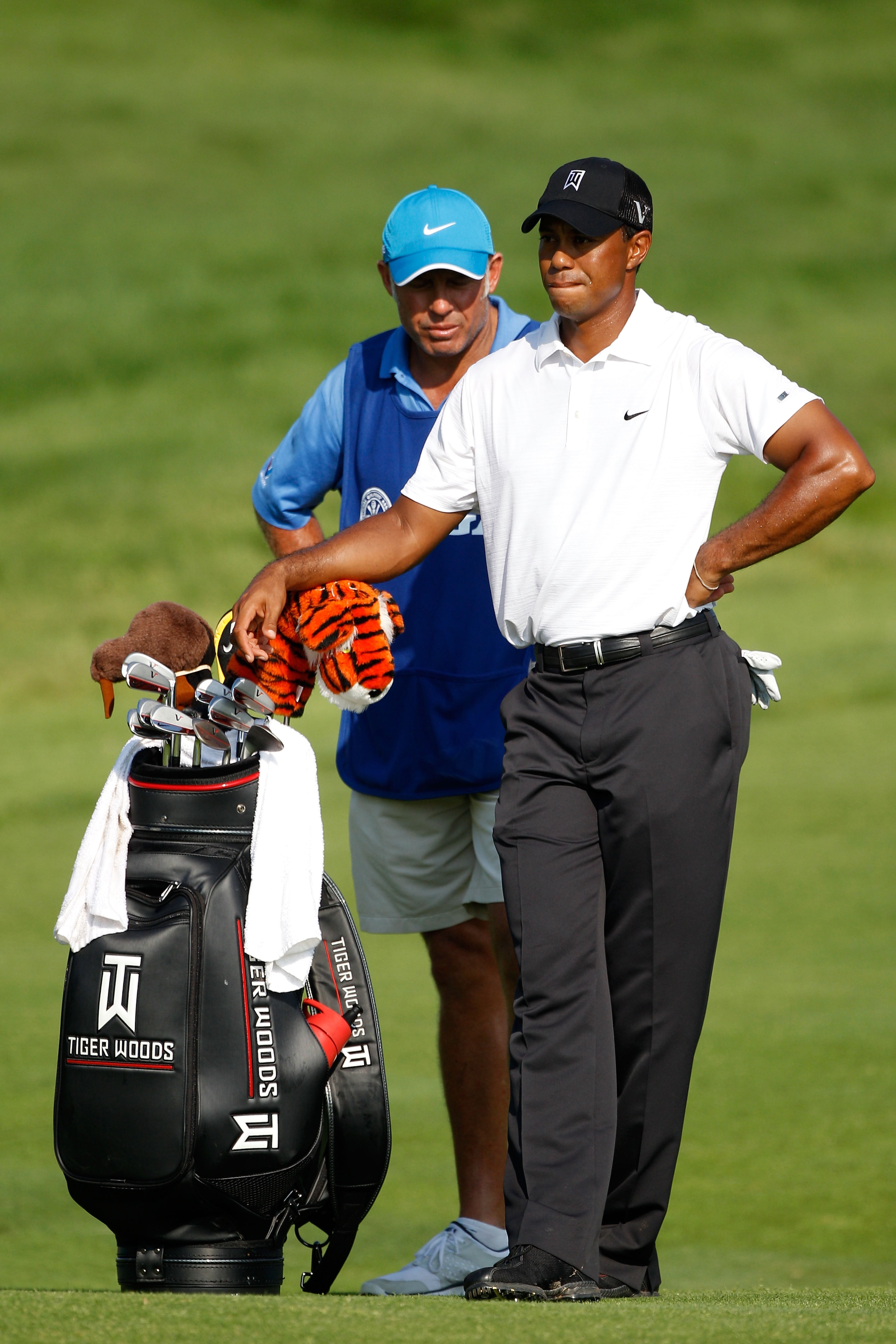 KOHLER, WI - AUGUST 12:  Tiger Woods waits with his caddie Steve Williams on the ninth hole during the first round of the 92nd PGA Championship on the Straits Course at Whistling Straits on August 12, 2010 in Kohler, Wisconsin.  (Photo by Chris Graythen/G