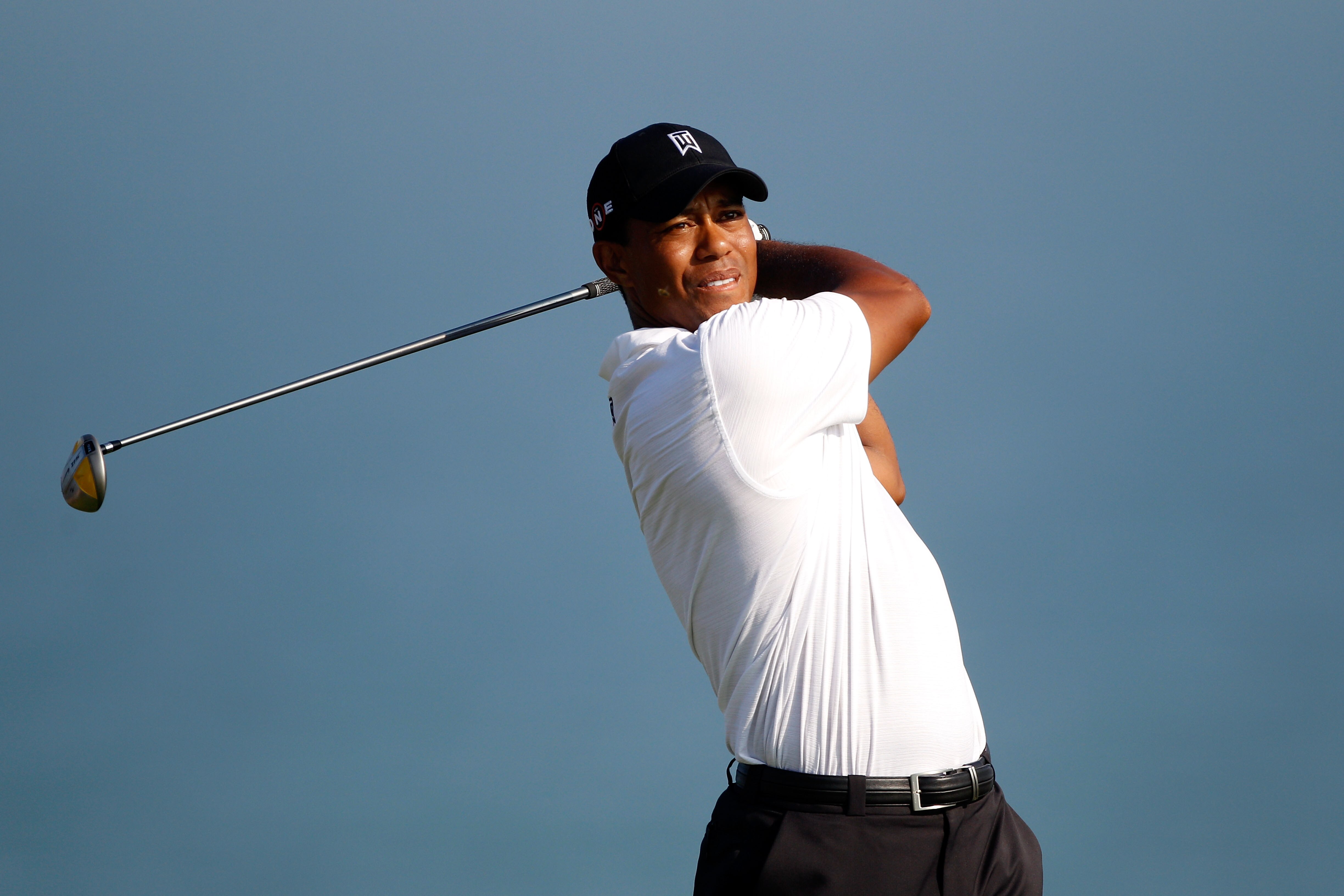 KOHLER, WI - AUGUST 12:  Tiger Woods hits a tee shot on the ninth hole during the first round of the 92nd PGA Championship on the Straits Course at Whistling Straits on August 12, 2010 in Kohler, Wisconsin.  (Photo by Chris Graythen/Getty Images)