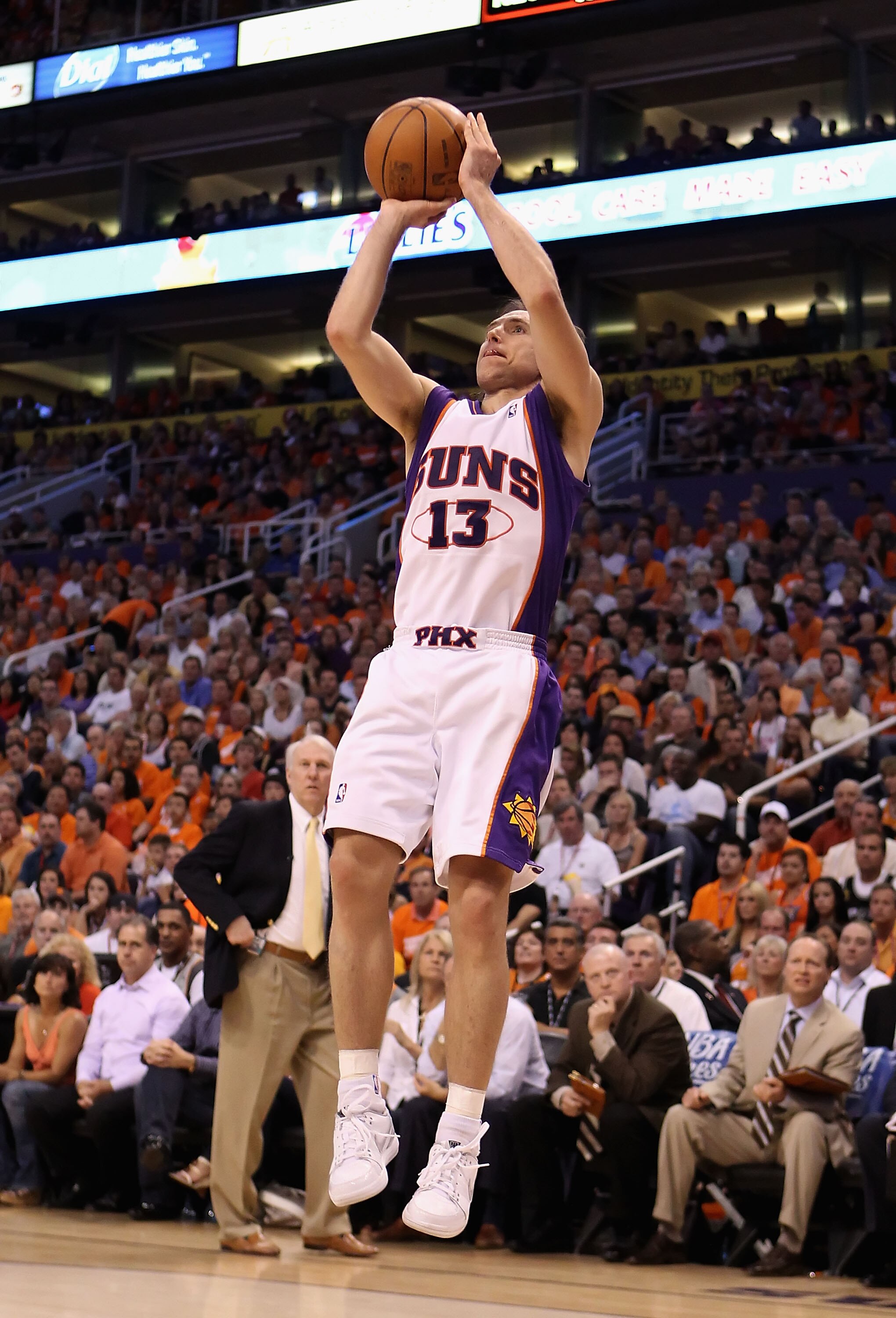 PHOENIX - MAY 03:  Steve Nash #13 of the Phoenix Suns puts up a shot against the San Antonio Spurs during Game One of the Western Conference Semifinals of the 2010 NBA Playoffs at US Airways Center on May 3, 2010 in Phoenix, Arizona. The Suns defeated the