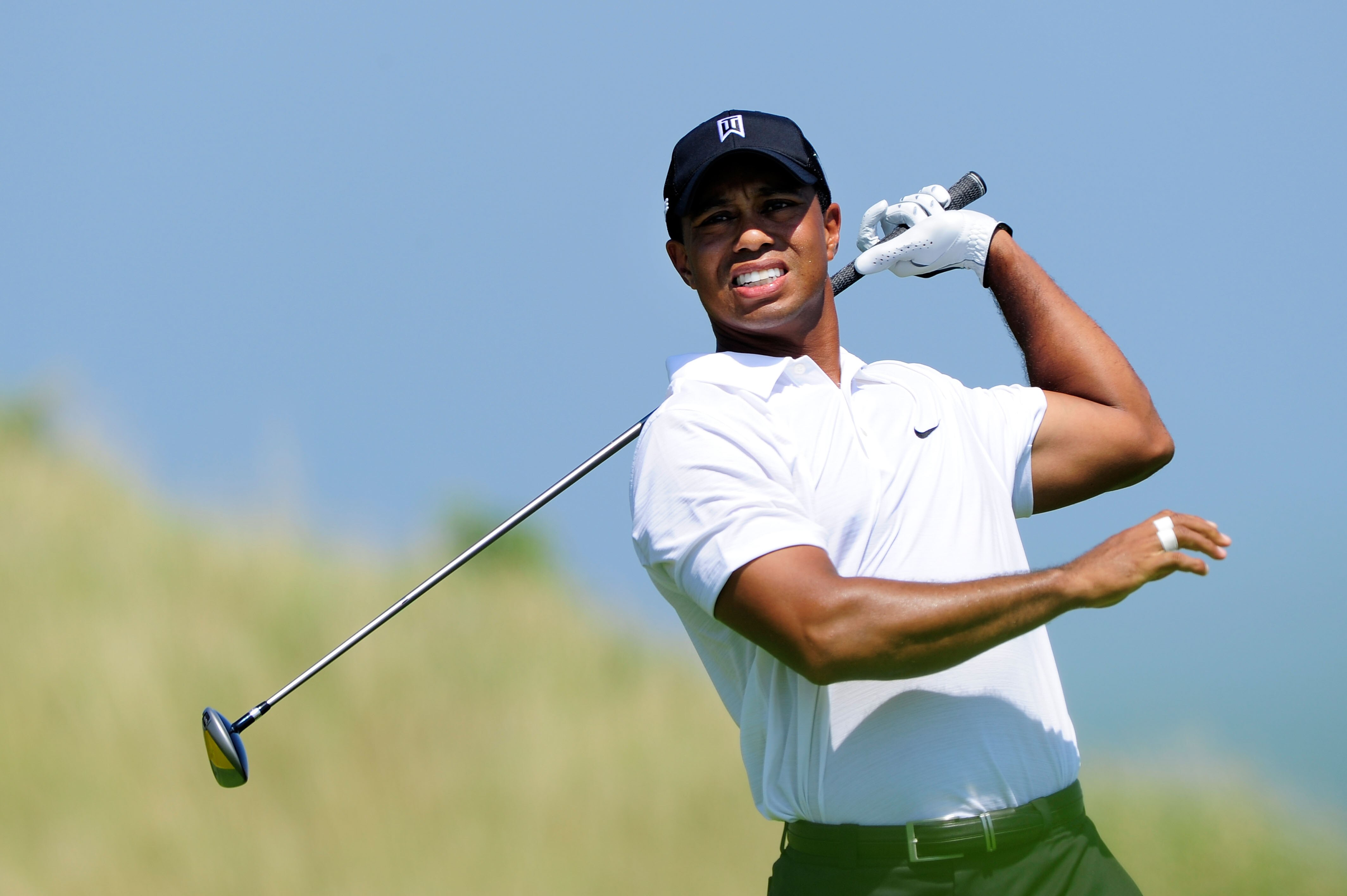 KOHLER, WI - AUGUST 12:  Tiger Woods watches his tee shot on the 14th hole during the first round of the 92nd PGA Championship on the Straits Course at Whistling Straits on August 12, 2010 in Kohler, Wisconsin.  (Photo by Stuart Franklin/Getty Images)