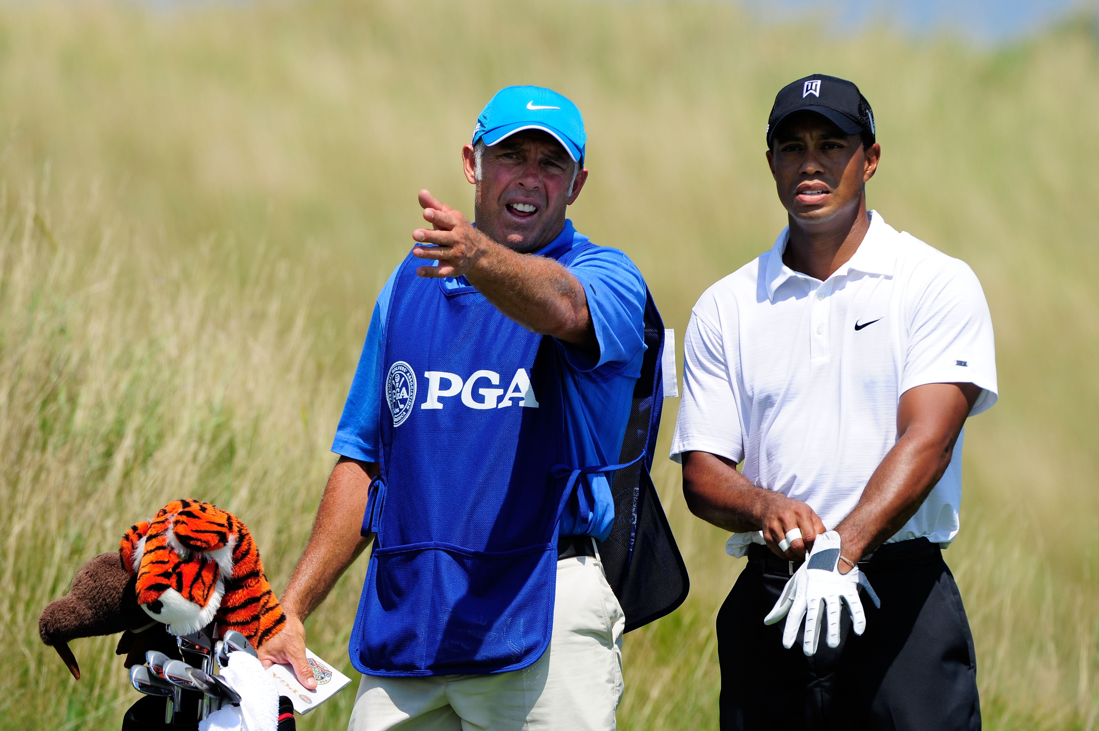 KOHLER, WI - AUGUST 12:  Tiger Woods chats with his caddie Steve Williams on the 14th tee during the first round of the 92nd PGA Championship on the Straits Course at Whistling Straits on August 12, 2010 in Kohler, Wisconsin.  (Photo by Stuart Franklin/Ge