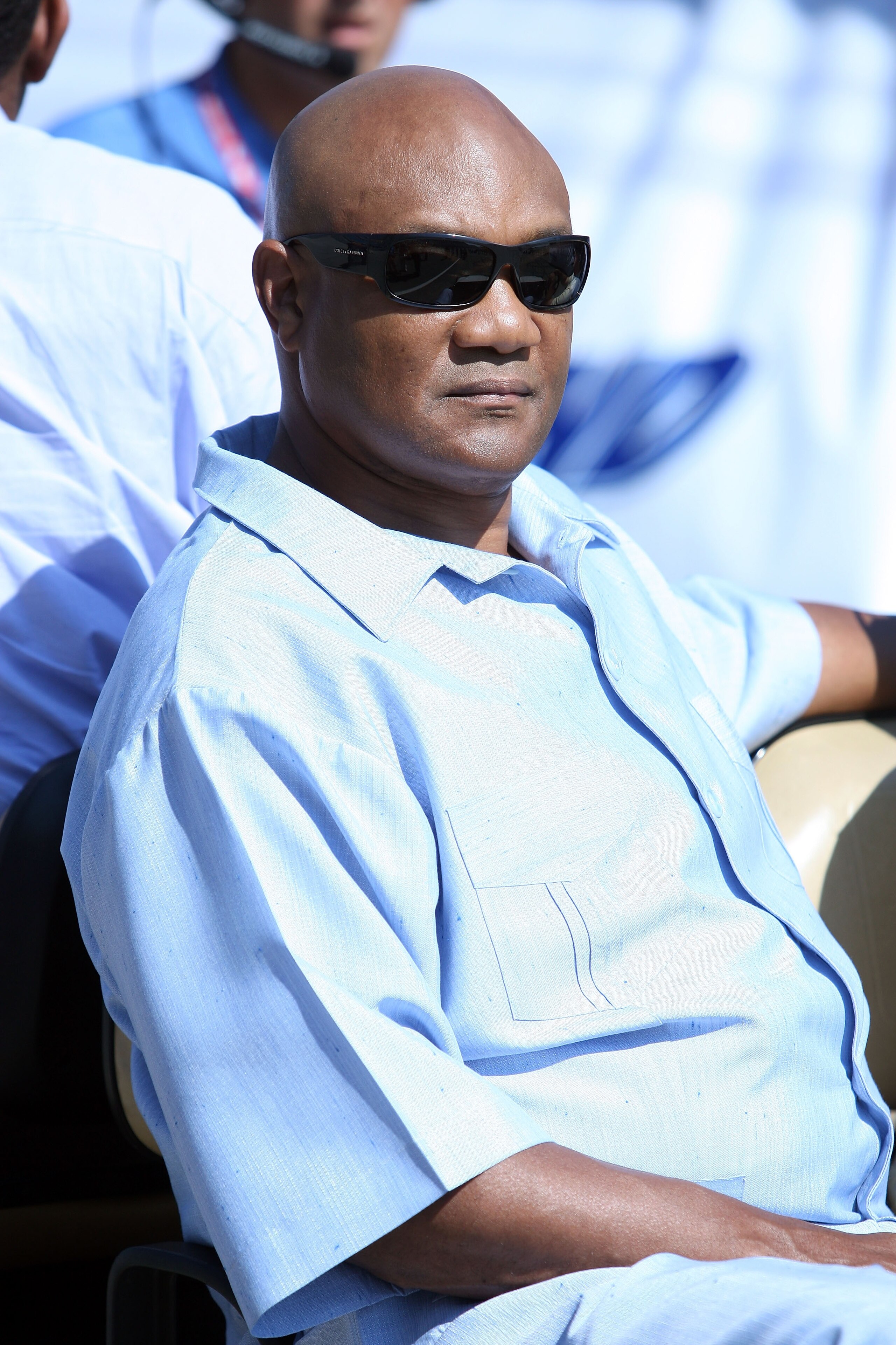 JOLIET, IL - SEPTEMBER 09:  Former heavyweight boxing champion George Foreman watches as daughter Natalie, sings 'God Bless America' prior to the start of the PEAK Antifreeze Indy 300 Presented By Mr. Clean September 9, 2007 at Chicagoland Speedway in Jol