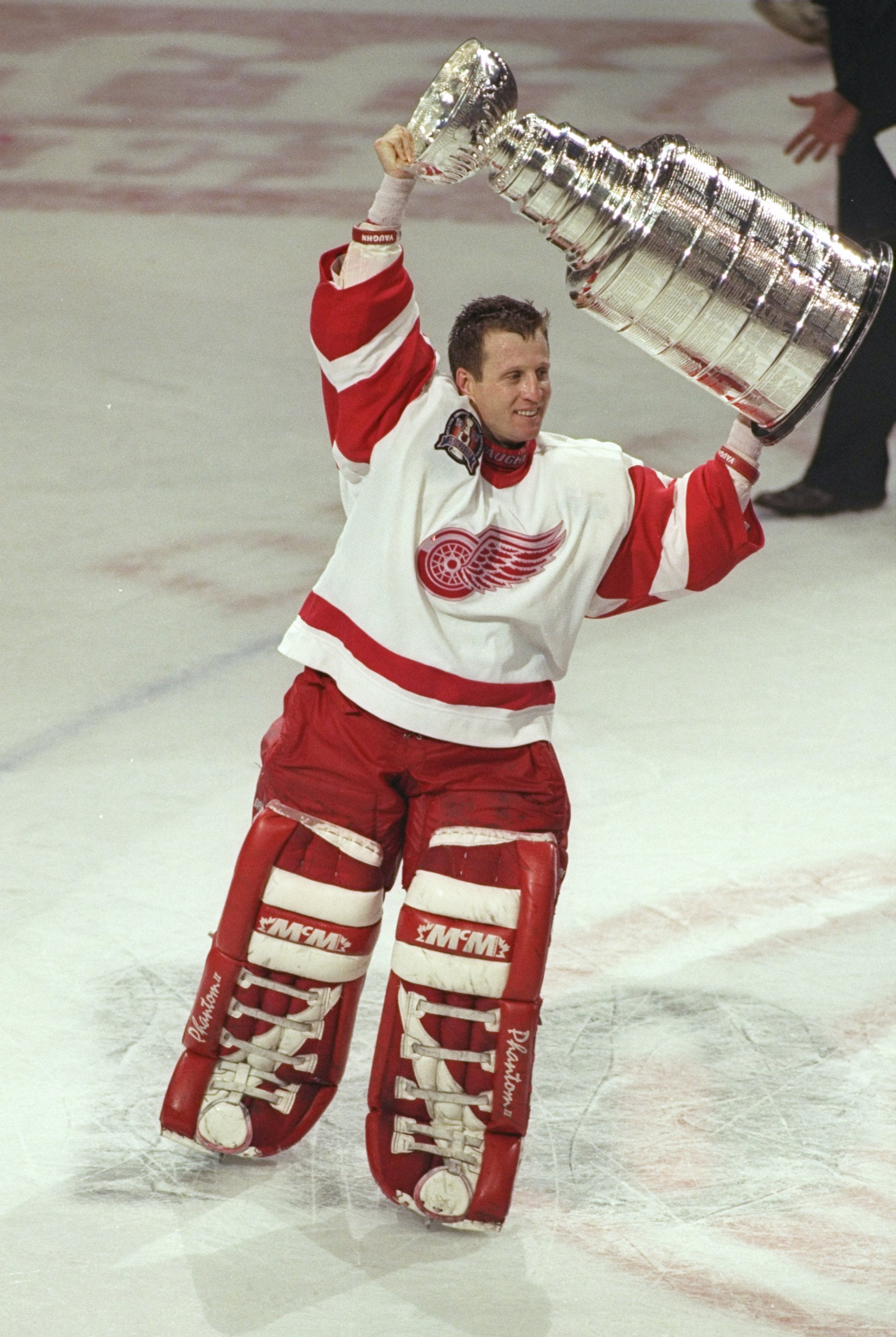 7 Jun 1997: Goaltender Mike Vernon of the Detroit Red Wings celebrates with the Stanley Cup after a playoff game against the Philadelphia Flyers at Joe Louis Arena in Detroit, Michigan. The Red Wings won the game, 2-1. Mandatory Credit: Al Bello /Allsp 7 Jun 1997: Goaltender Mike Vernon of the Detroit Red Wings celebrates with the Stanley Cup after a playoff game against the Philadelphia Flyers at Joe Louis Arena in Detroit, Michigan. The Red Wings won the game, 2-1. Mandatory Credit: Al Bello /Allsp