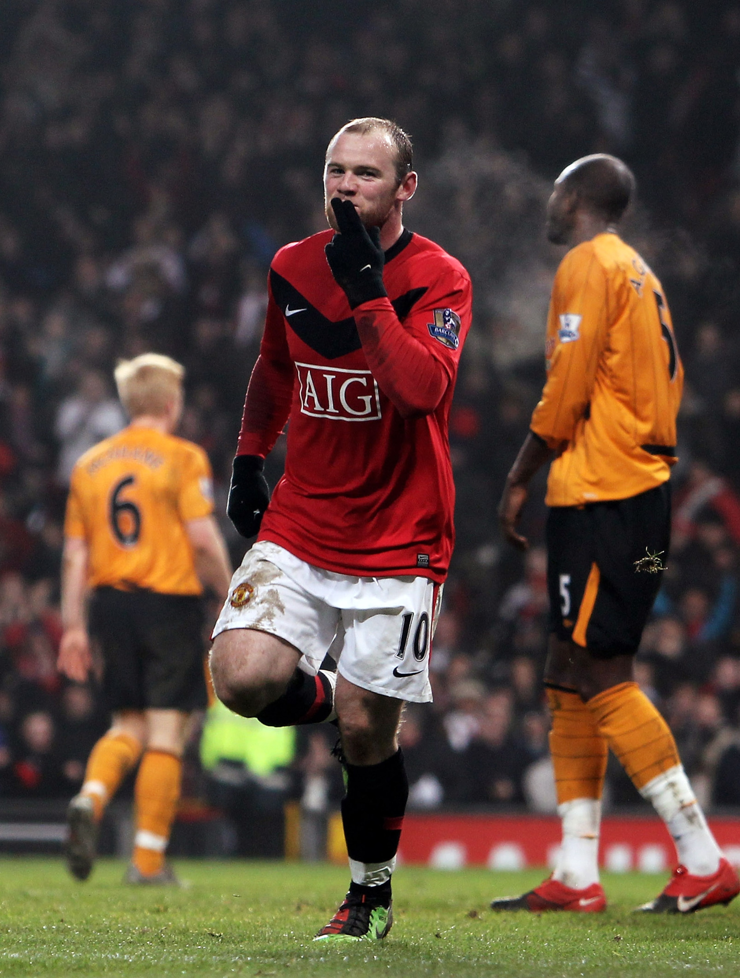 MANCHESTER, ENGLAND - JANUARY 23:  Wayne Rooney of Manchester United celebrates scoring his hat-trick during the Barclays Premier League match between Manchester United and Hull City at Old Trafford on January 23, 2010 in Manchester, England.  (Photo by J