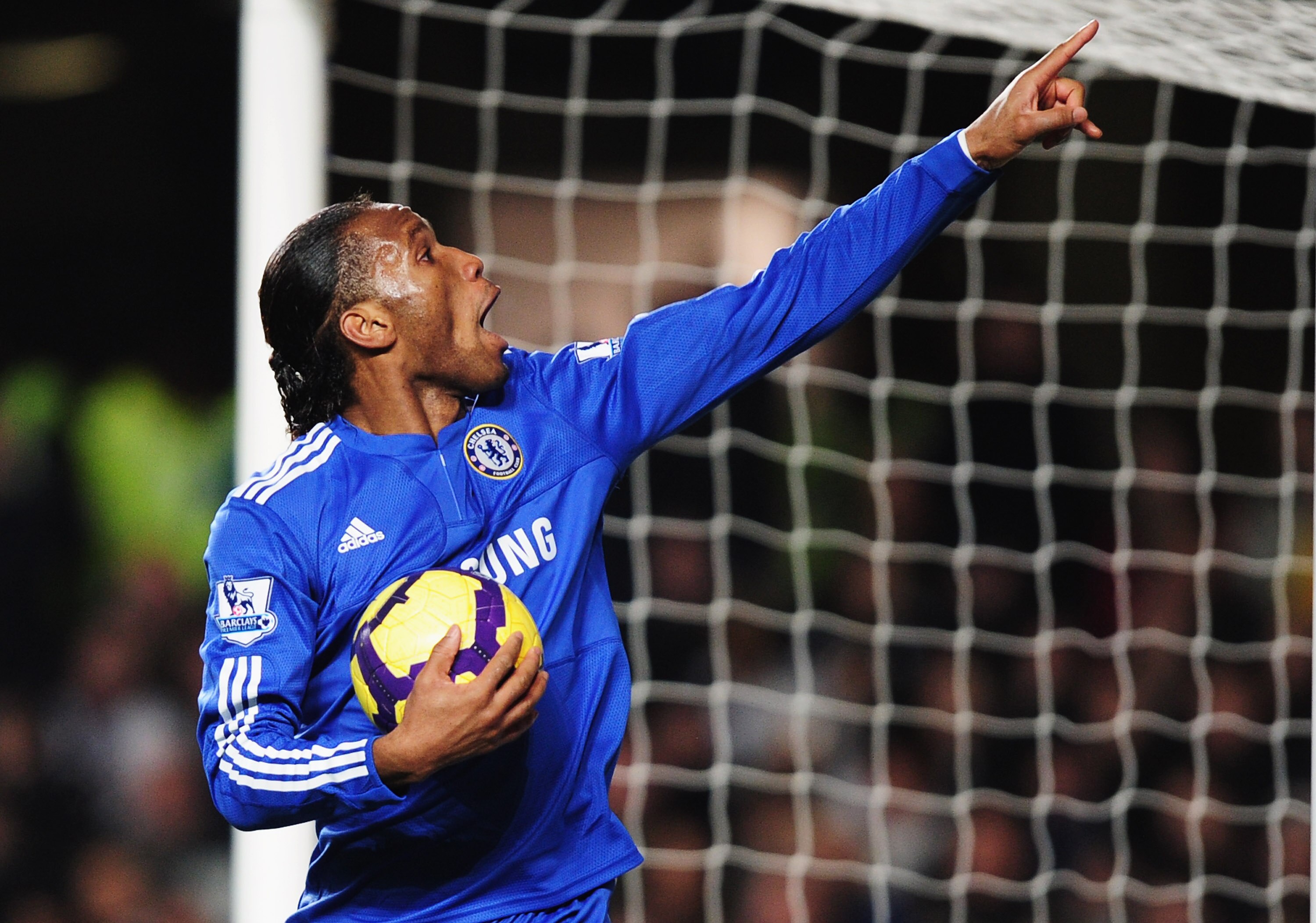 LONDON, ENGLAND - DECEMBER 28:  Didier Drogba of Chelsea celebrates as he scores their first goal during the Barclays Premier League match between Chelsea and Fulham at Stamford Bridge on December 28, 2009 in London, England.  (Photo by Clive Mason/Getty