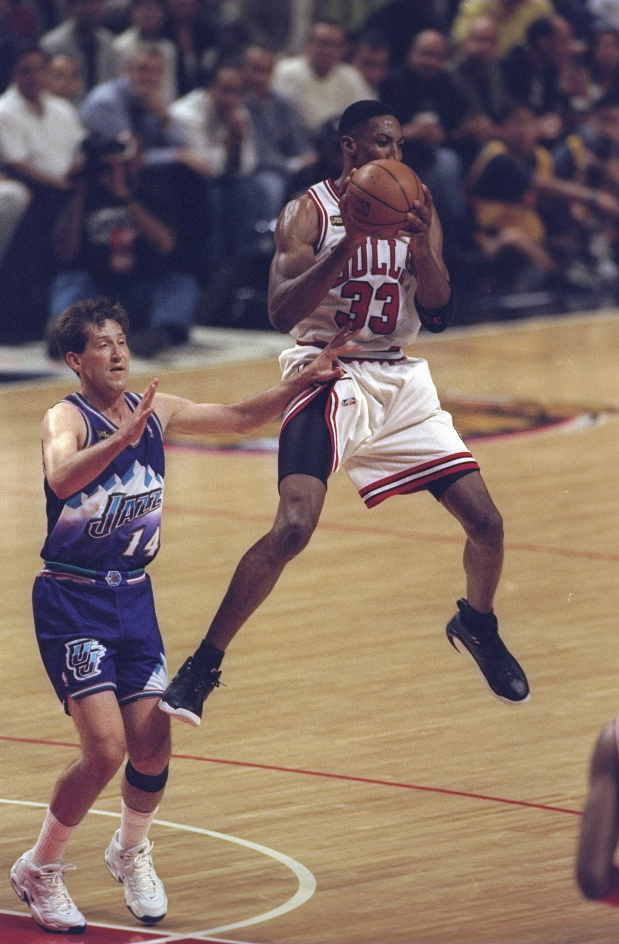 10 Jun 1998:  Scottie Pippen #33 of the Chicago Bulls in action against Jeff Hornasek of the Utah Jazz during the NBA Finals Game 4 at the United Center in Chicago, Illinois.  The Bulls defeated the Jazz 86-82. Mandatory Credit: Jonathan Daniel  /Allsport