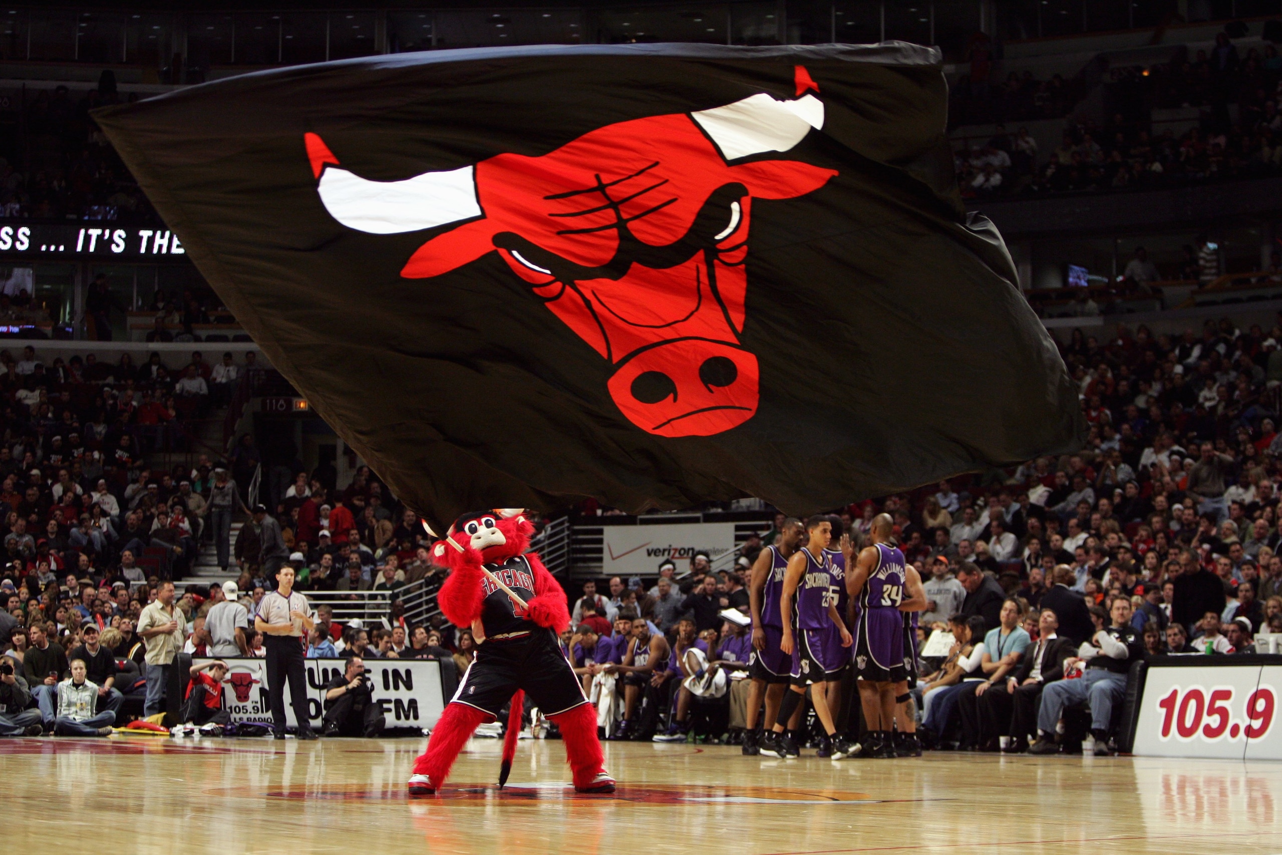 CHICAGO - NOVEMBER 3:  Benny the Bull, the Chicago Bulls mascot, waves the team flag at center court during a game against the Sacramento Kings at the United Center on November 3, 2006 in Chicago, Illinois.  The Kings defeated the Bulls 89-88.  NOTE TO US