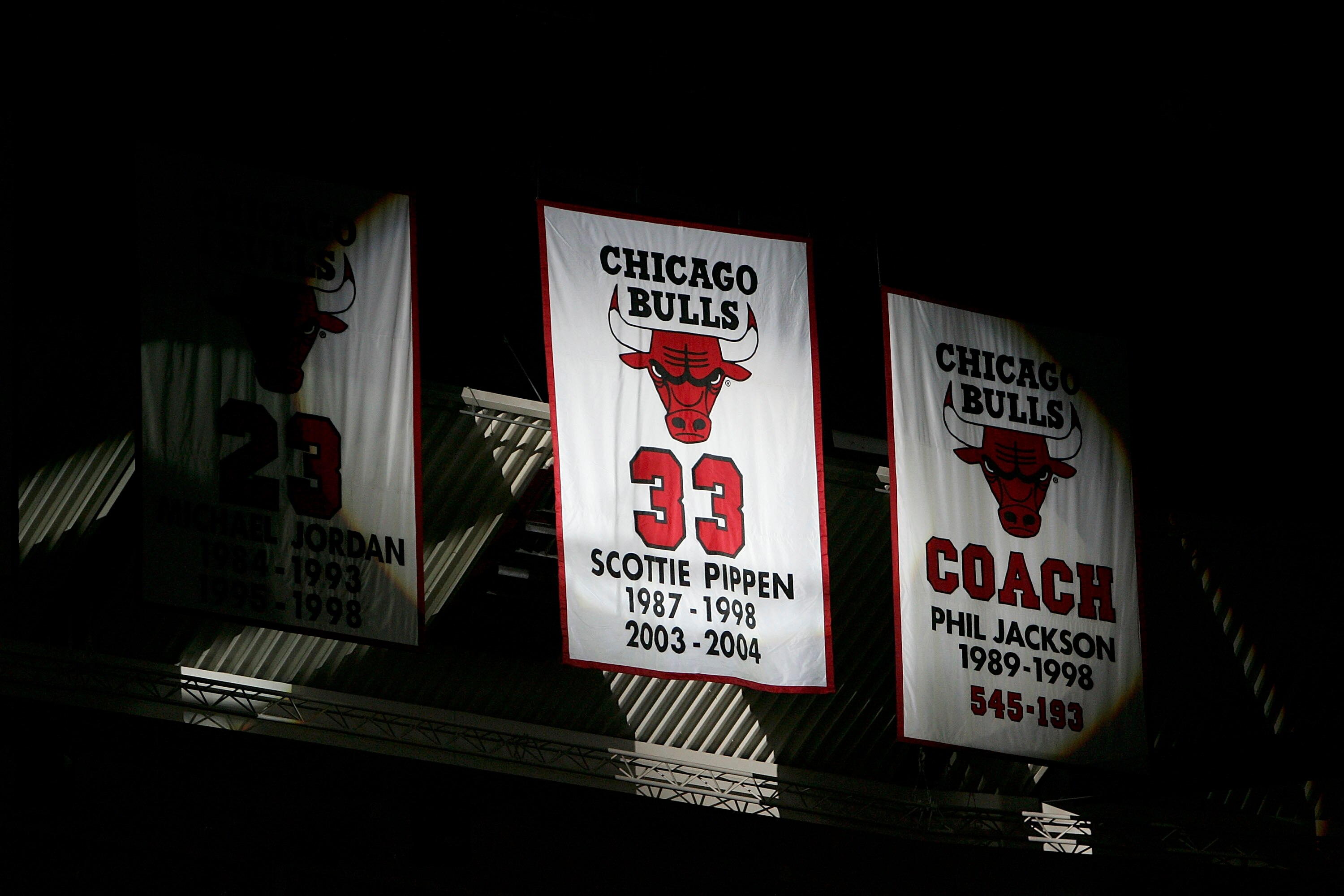 CHICAGO - DECEMBER 9:  A banner with the number of former Chicago Bull Scottie Pippen is unfurled during a ceremony retiring his #33 at halftime of a game between the Bulls and the Los Angeles Lakers on December 9, 2005 at the United Center in Chicago, Il