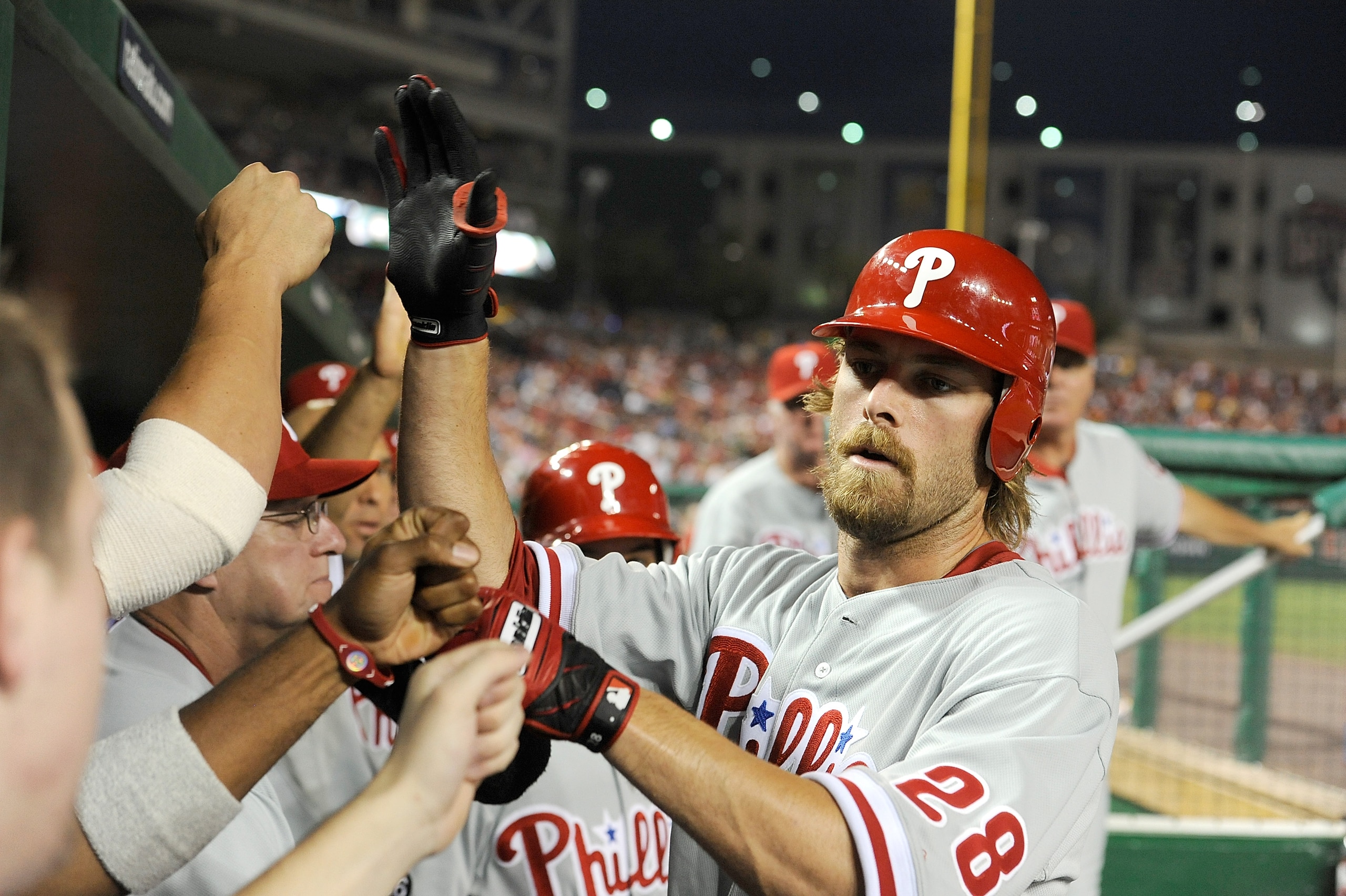 WASHINGTON - JULY 30:  Jayson Werth #28 of the Philadelphia Phillies is congratulated by teammates after hitting a home run in the seventh inning against the Washington Nationals at Nationals Park on July 30, 2010 in Washington, DC.  (Photo by Greg Fiume/