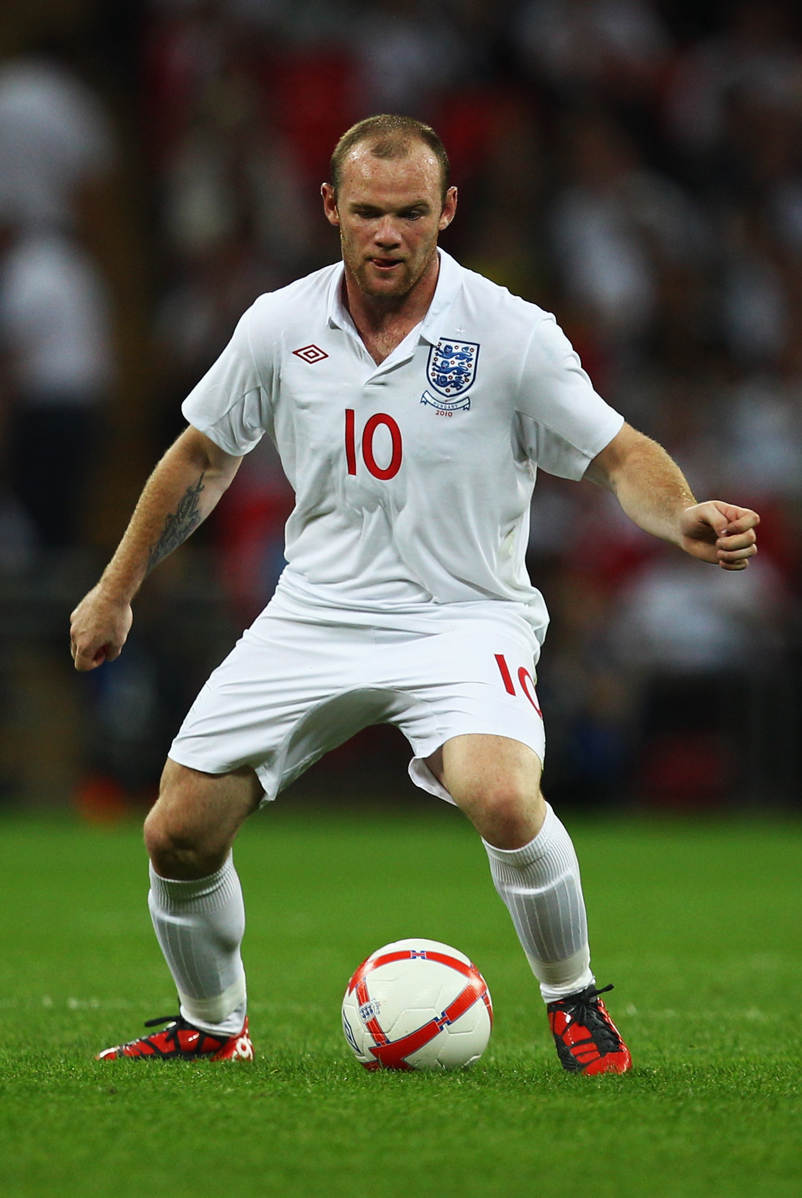 LONDON, ENGLAND - AUGUST 11: Wayne Rooney of England in action during the International Friendly match between England and Hungary at Wembley Stadium on August 11, 2010 in London, England. (Photo by Richard Heathcote/Getty Images) LONDON, ENGLAND - AUGUST 11: Wayne Rooney of England in action during the International Friendly match between England and Hungary at Wembley Stadium on August 11, 2010 in London, England. (Photo by Richard Heathcote/Getty Images)