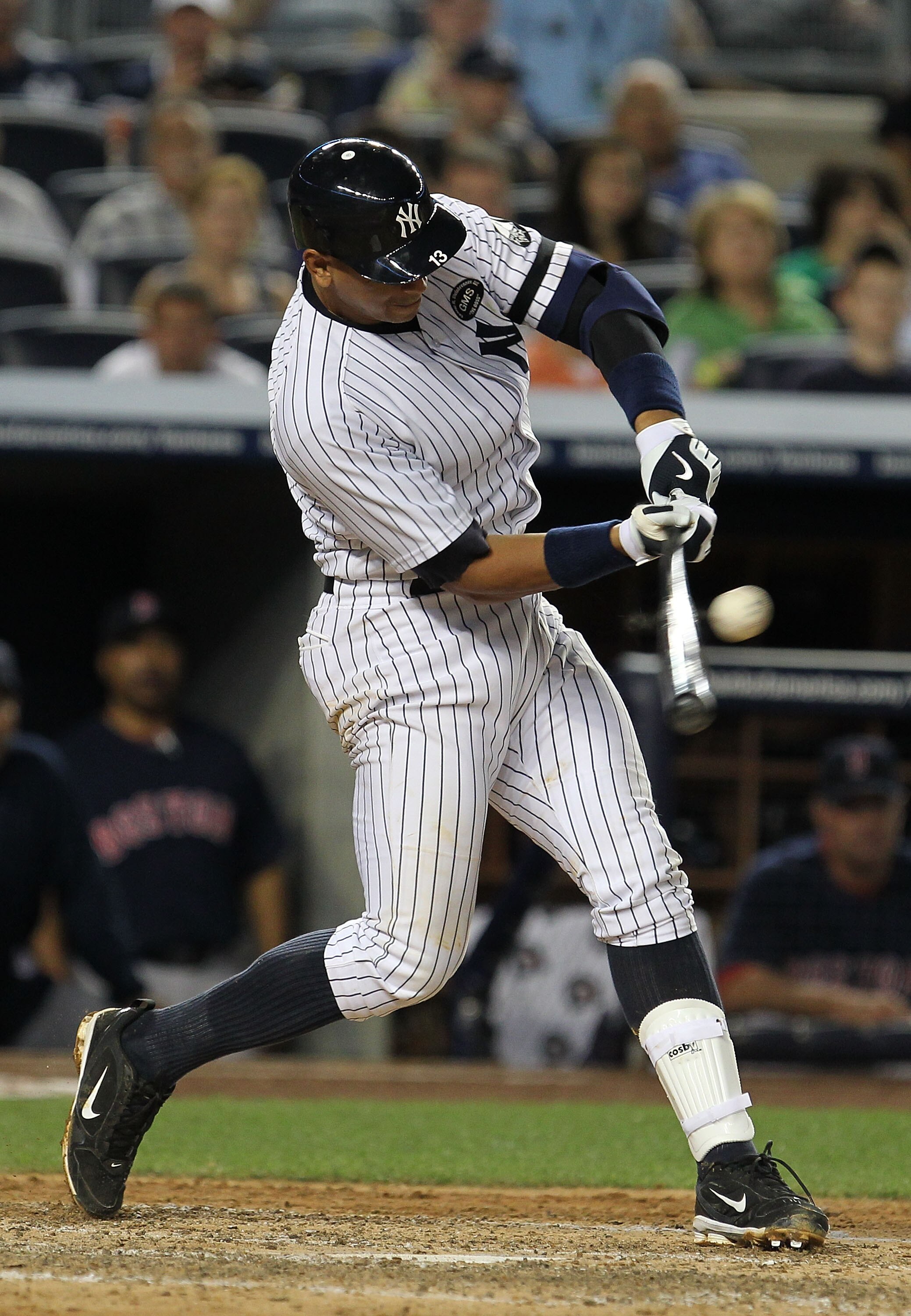 NEW YORK - AUGUST 06:  Alex Rodriguez #13 of the New York Yankees drives in a run against the Boston Red Sox on August 6, 2010 at Yankee Stadium in the Bronx borough of New York City.  (Photo by Al Bello/Getty Images)