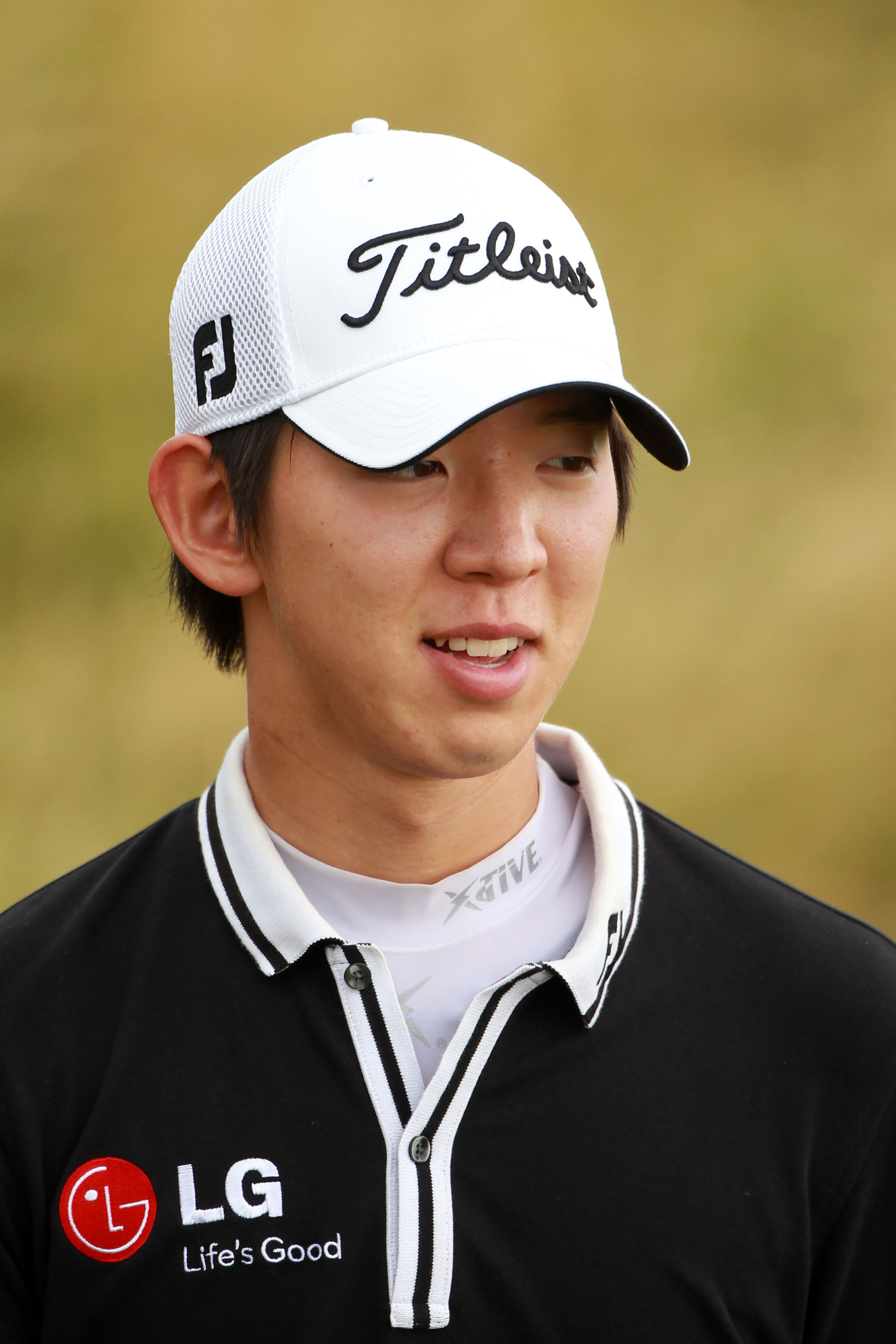 KOHLER, WI - AUGUST 11:  Seung Yul Noh of South Korea walks across a green during a practice round prior to the start of the 92nd PGA Championship on the Straits Course at Whistling Straits on August 11, 2010 in Kohler, Wisconsin.  (Photo by Andrew Reding