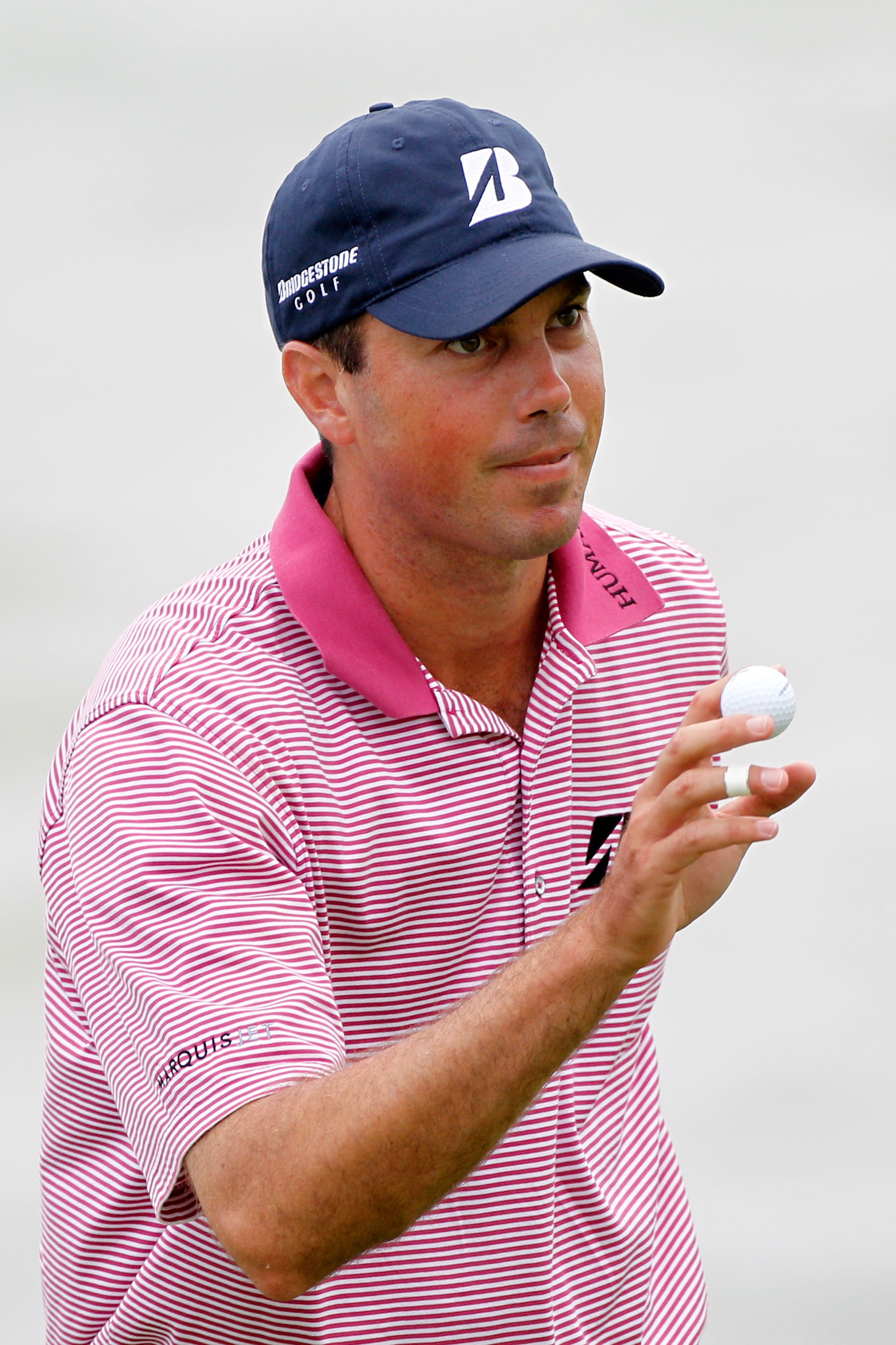 KOHLER, WI - AUGUST 13:  Matt Kuchar waves to the gallery on the seventh green during the continuation of the first round of the 92nd PGA Championship on the Straits Course at Whistling Straits on August 13, 2010 in Kohler, Wisconsin.  (Photo by Sam Green
