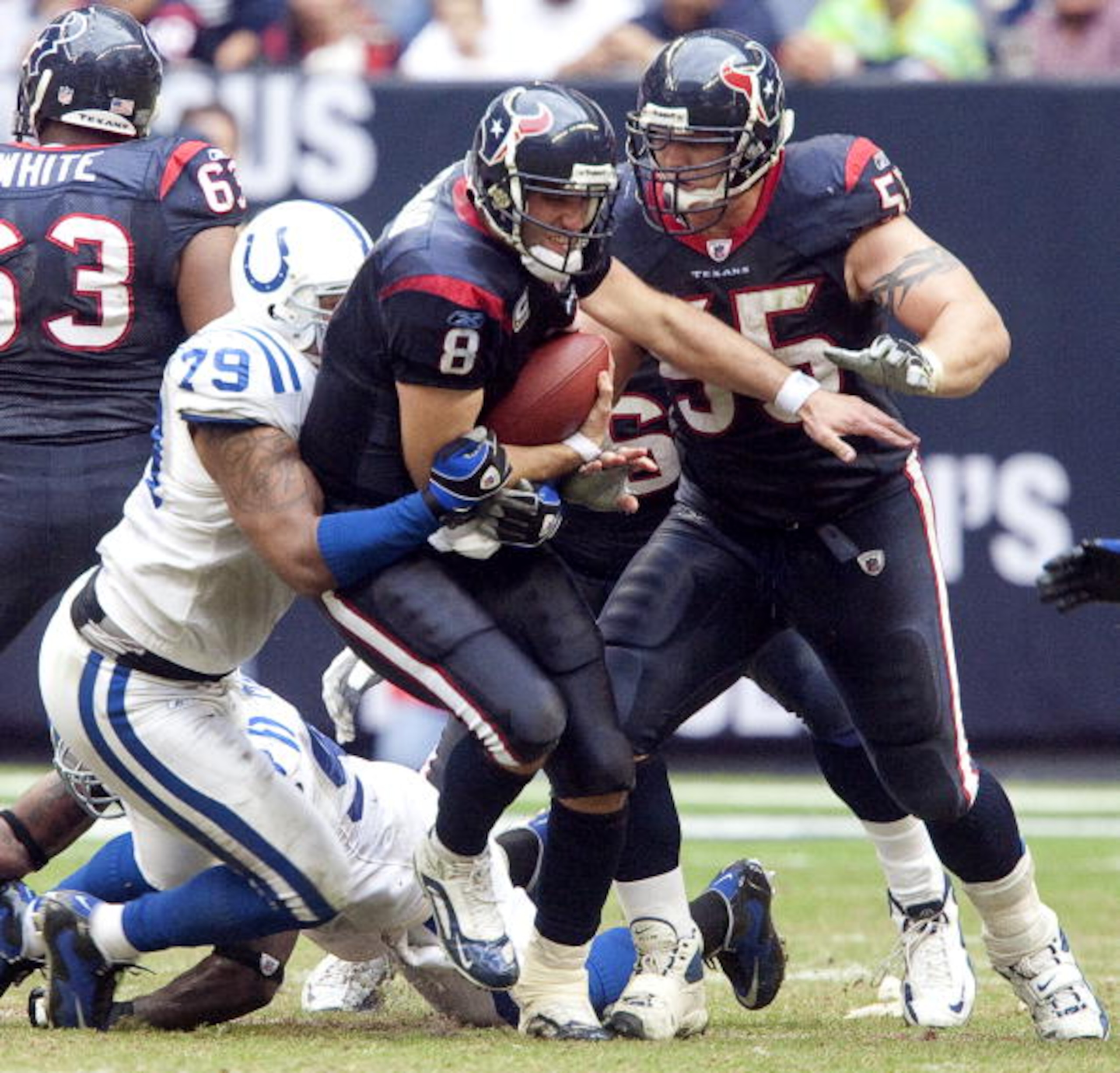 HOUSTON - NOVEMBER 29:  Quarterback Matt Schaub #8 of the Houston Texans is sacked by defensive end Raheem Brock #79 of the Indianapolis Colts at Reliant Stadium November 29, 2009 in Houston, Texas.  (Photo by Bob Levey/Getty Images)