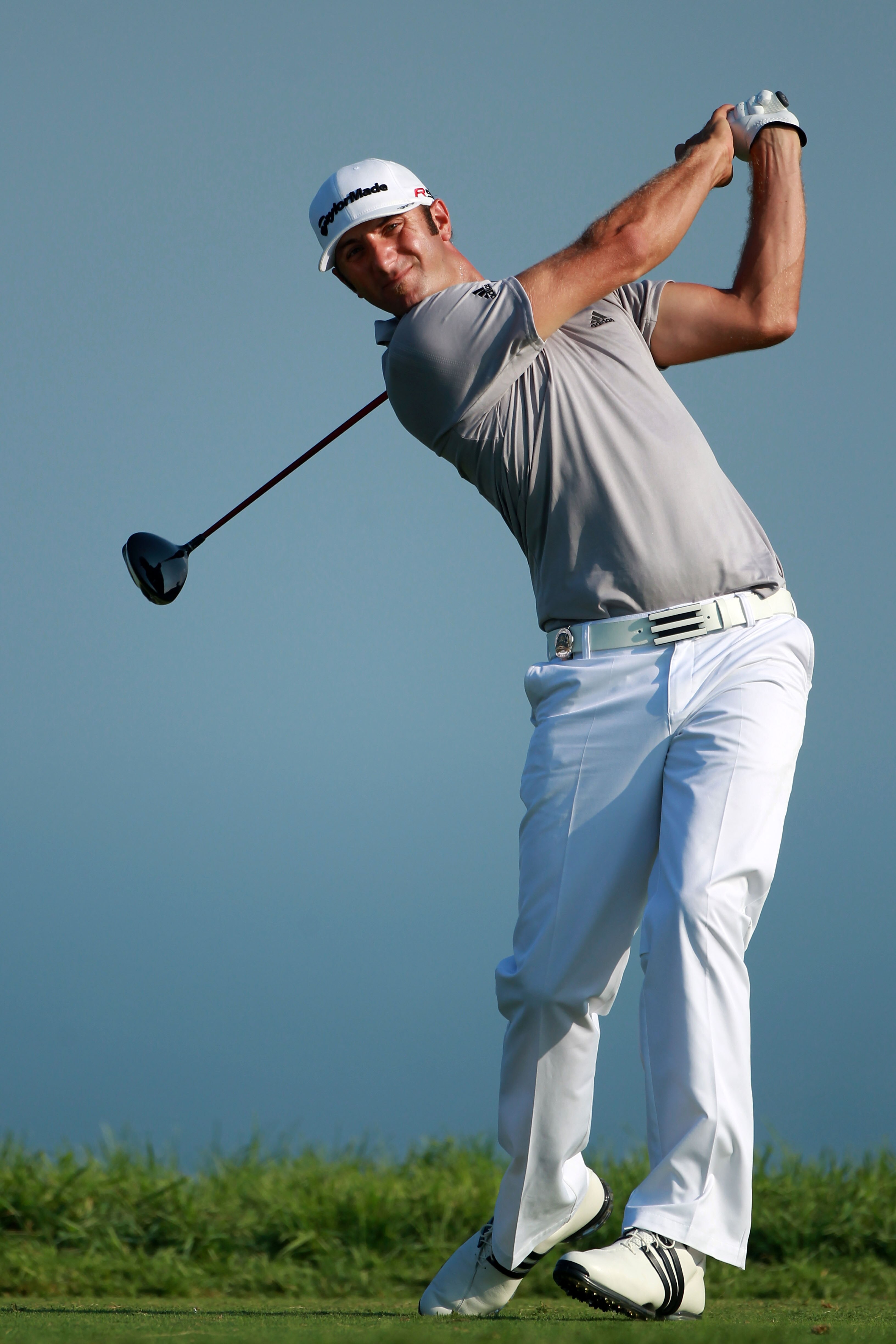 KOHLER, WI - AUGUST 12:  Dustin Johnson hits his tee shot on the fifth hole during the first round of the 92nd PGA Championship on the Straits Course at Whistling Straits on August 12, 2010 in Kohler, Wisconsin.  (Photo by Andrew Redington/Getty Images)