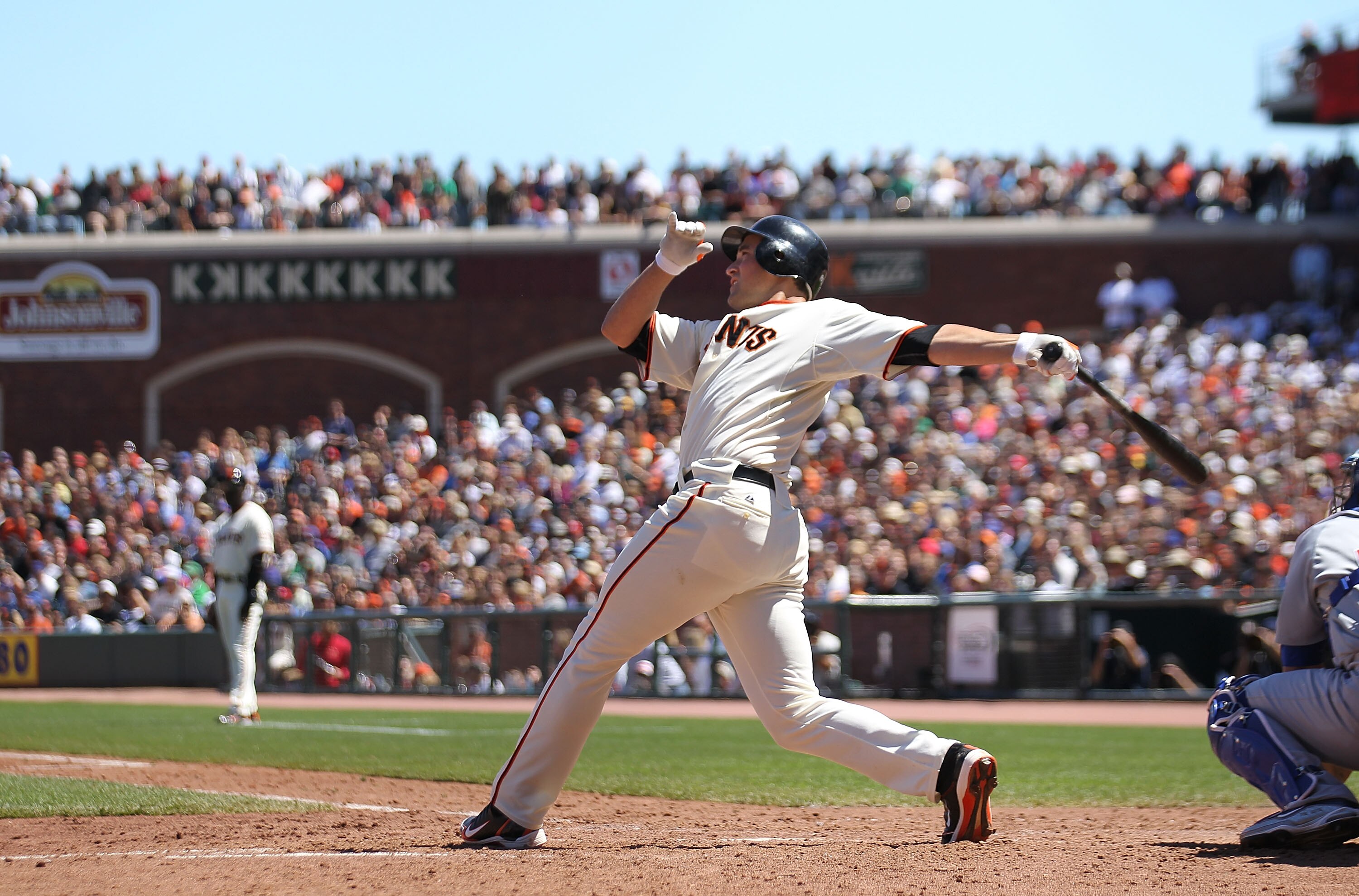 SAN FRANCISCO - AUGUST 12:  Pat Burrell #9 of the San Francisco Giants hits a grand slam against the Chicago Cubs in the fifth inning during an MLB game at AT&T Park on August 12, 2010 in San Francisco, California.  (Photo by Jed Jacobsohn/Getty Images)