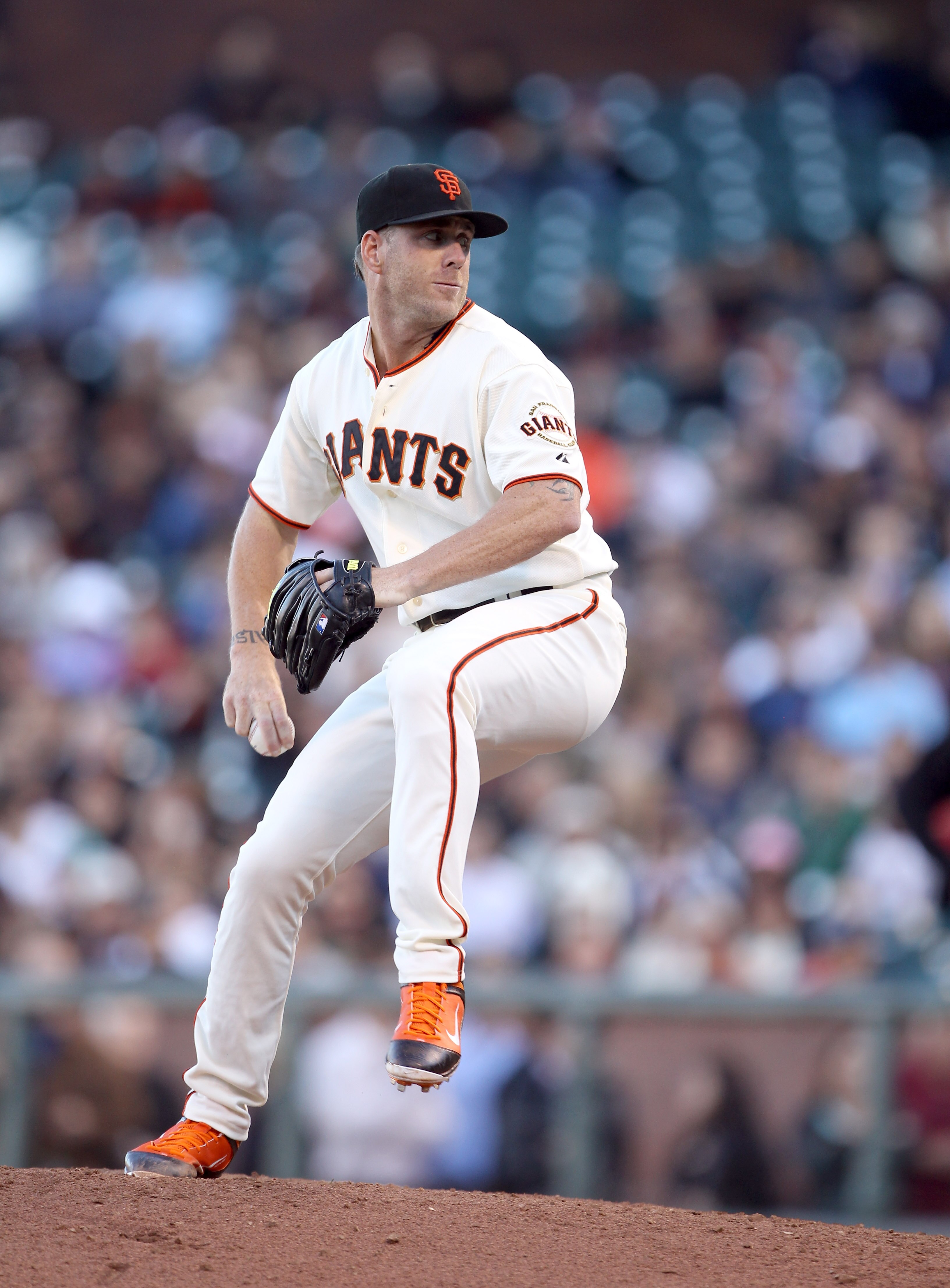 SAN FRANCISCO - JULY 28:  Brian Wilson #38 of the San Francisco Giants pitches against the Florida Marlins at AT&T Park on July 28, 2010 in San Francisco, California.  (Photo by Ezra Shaw/Getty Images)