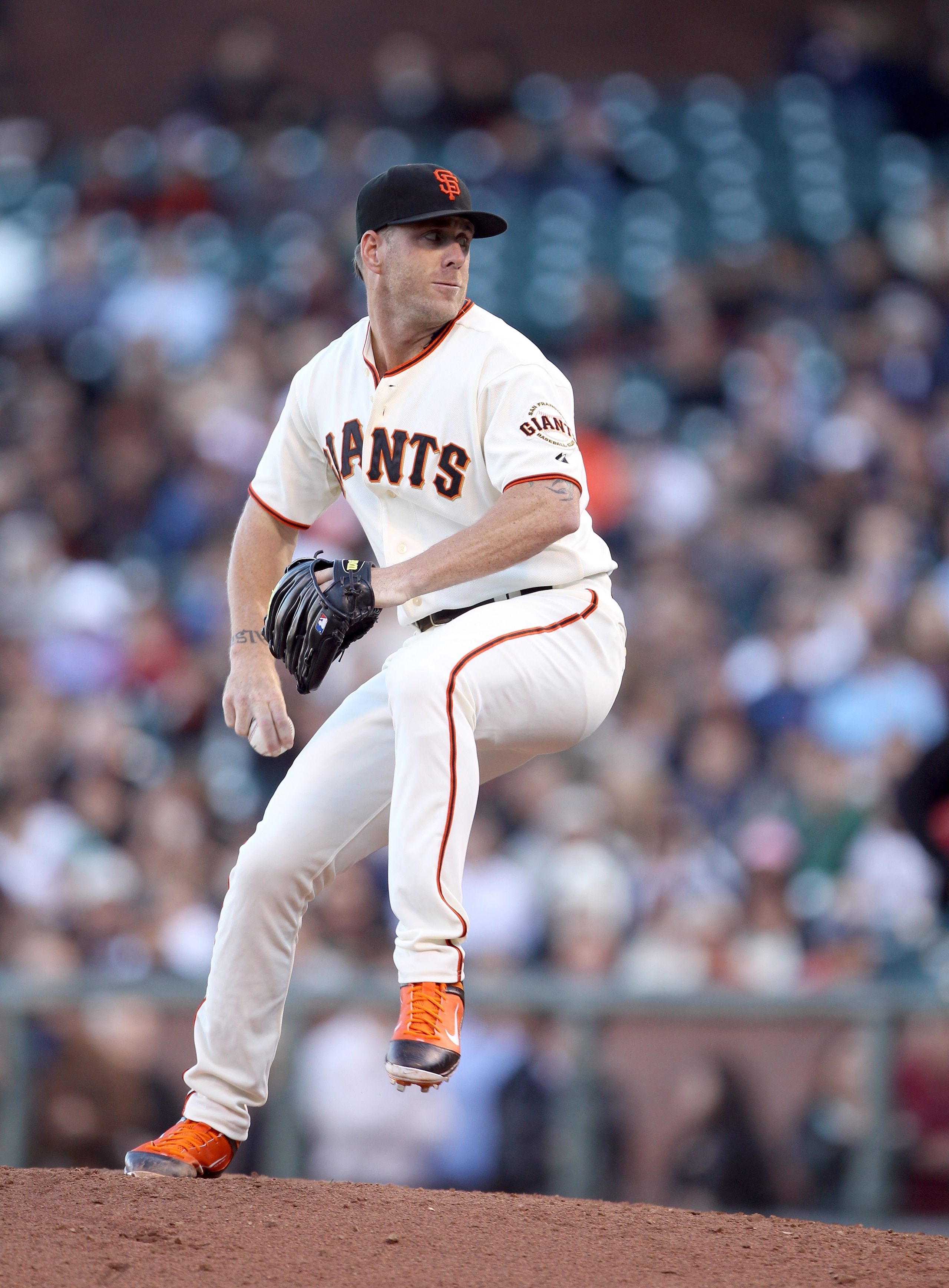 SAN FRANCISCO - JULY 28:  Brian Wilson #38 of the San Francisco Giants pitches against the Florida Marlins at AT&T Park on July 28, 2010 in San Francisco, California.  (Photo by Ezra Shaw/Getty Images)