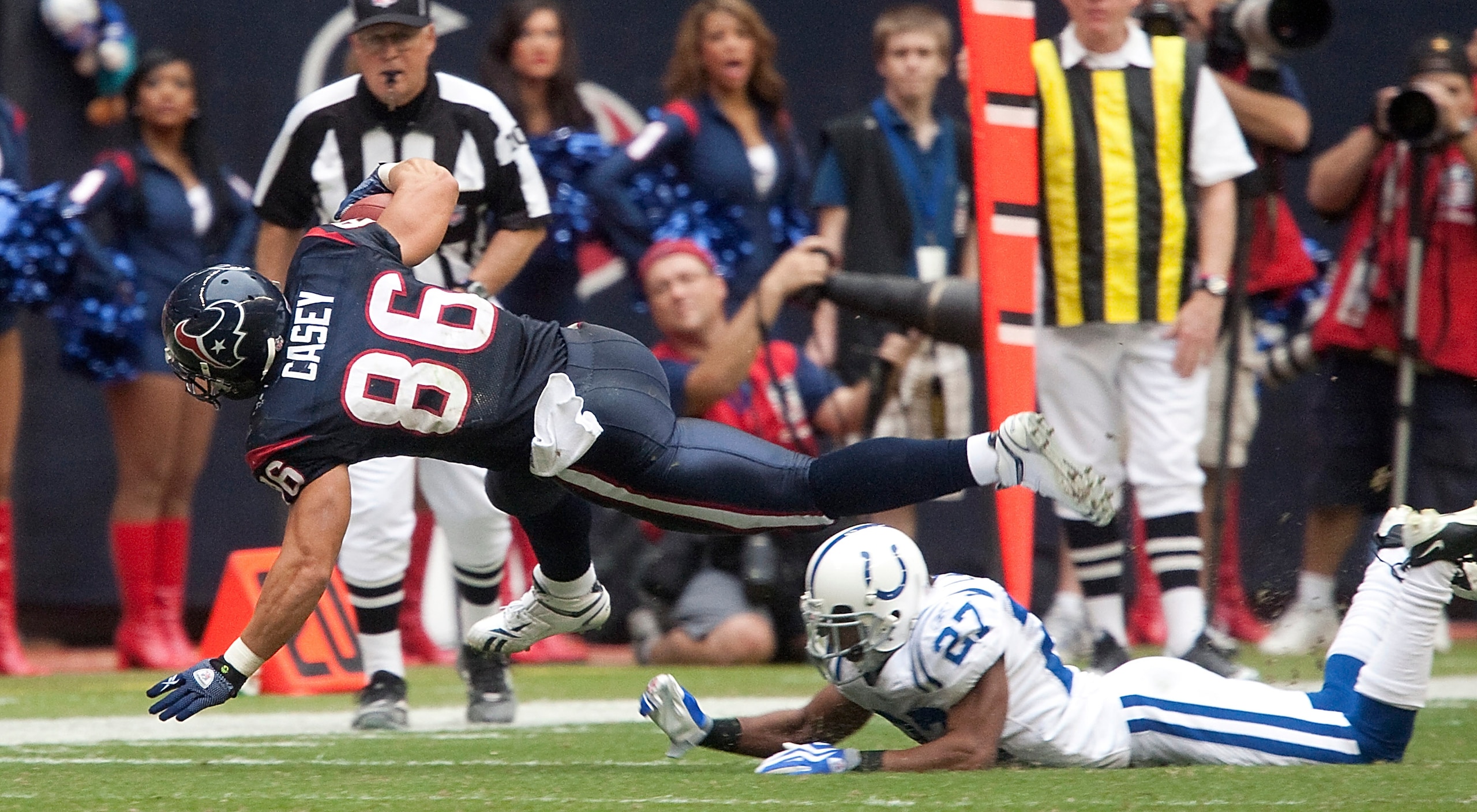 HOUSTON - NOVEMBER 29: Tight-end James Casey #86 of the Houston Texans is tripped up by defensive back Jacob Lacey #27 of the Indianapolis Colts at Reliant Stadium on November 29, 2009 in Houston, Texas. (Photo by Bob Levey/Getty Images) HOUSTON - NOVEMBER 29: Tight-end James Casey #86 of the Houston Texans is tripped up by defensive back Jacob Lacey #27 of the Indianapolis Colts at Reliant Stadium on November 29, 2009 in Houston, Texas. (Photo by Bob Levey/Getty Images)