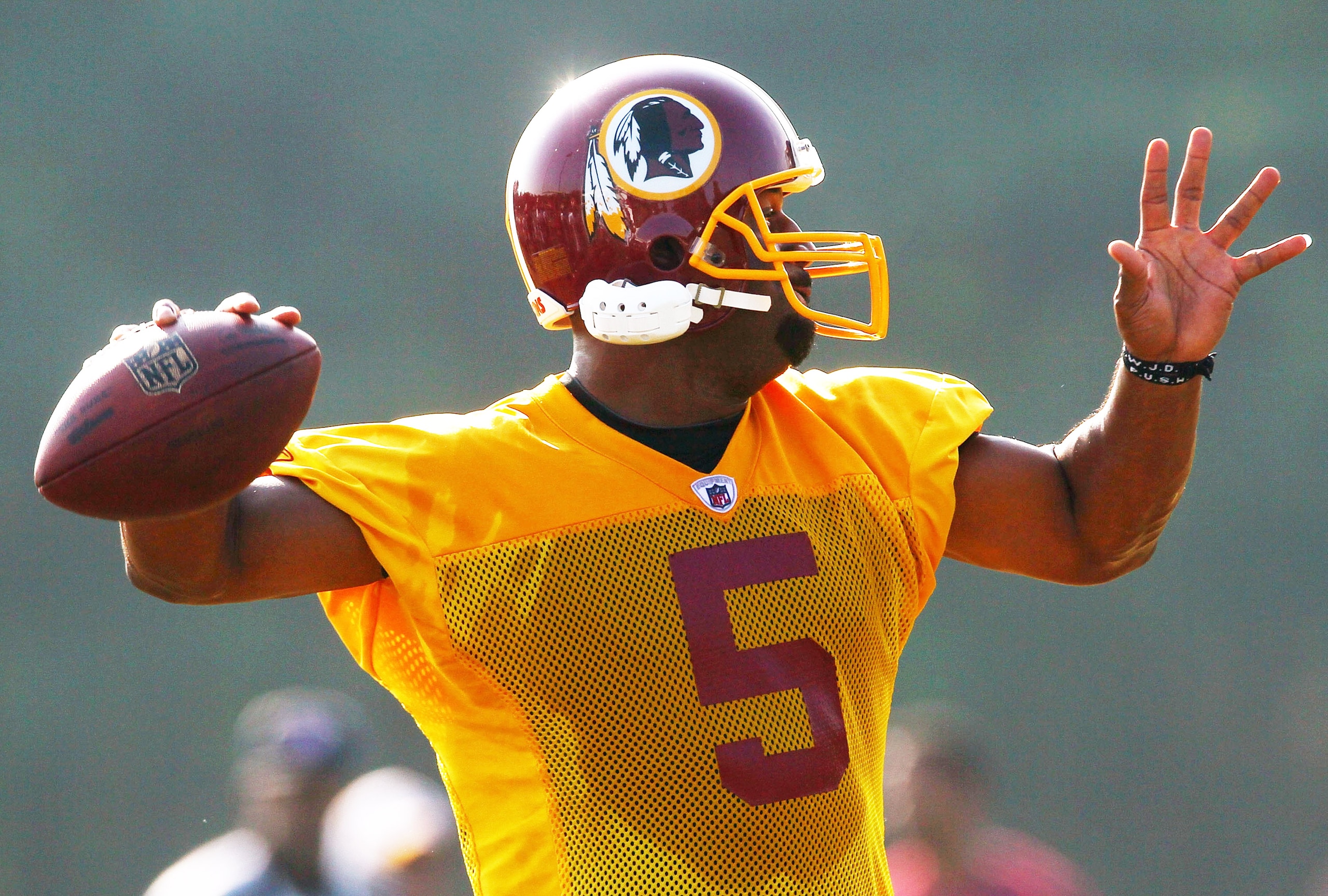 ASHBURN, VA - AUGUST 06:  Quarterback Donovan McNabb #5 of the Washington Redskins takes part in drills during Redskins training camp on August 6, 2010 in Ashburn, Virginia.  (Photo by Win McNamee/Getty Images)