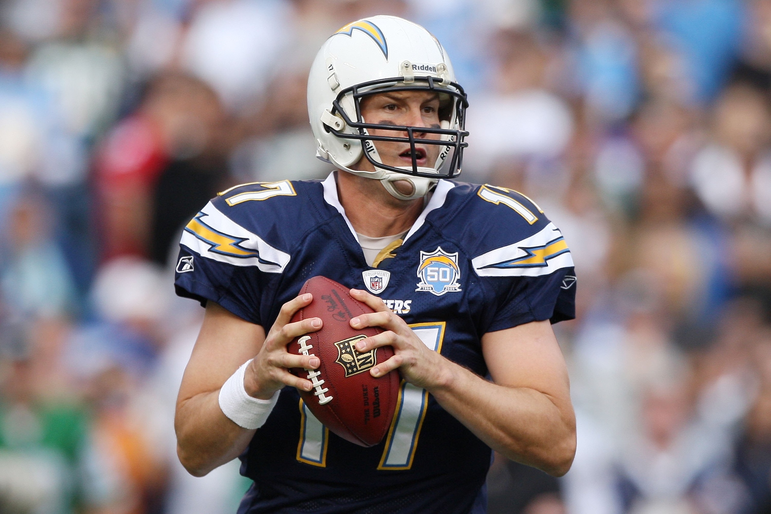 SAN DIEGO - JANUARY 17:  Quarterback Philip Rivers #17 of the San Diego Chargers drops back to pass against the New York Jets during the AFC Divisional Playoff Game at Qualcomm Stadium on January 17, 2010 in San Diego, California.  (Photo by Donald Mirall