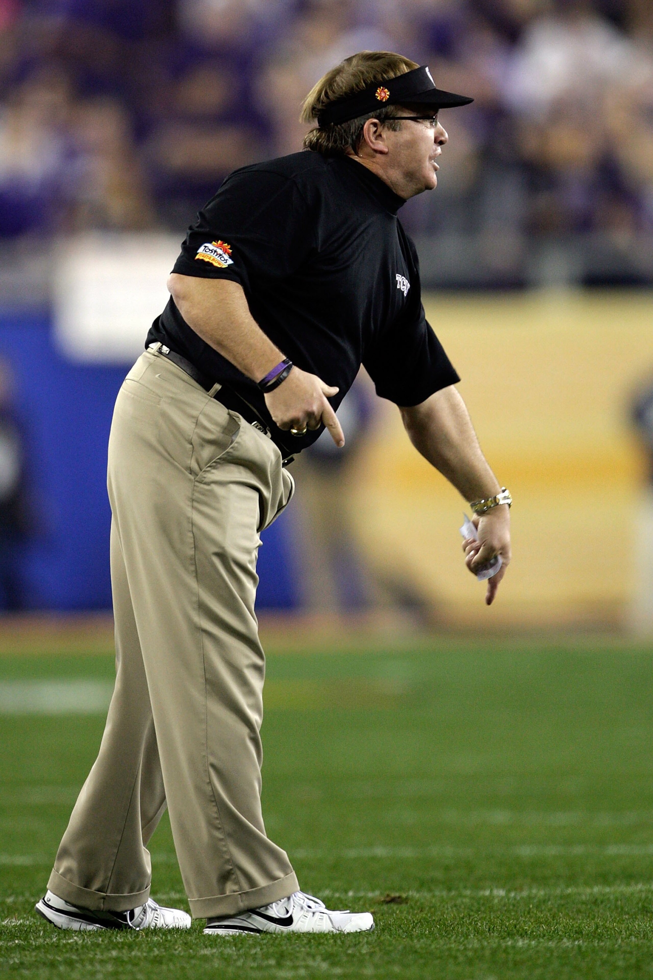 GLENDALE, AZ - JANUARY 04:  Head coach Gary Patterson of the TCU Horned Frogs reacts against the Boise State Broncos during the Tostitos Fiesta Bowl at the Universtity of Phoenix Stadium on January 4, 2010 in Glendale, Arizona.  (Photo by Jamie Squire/Get