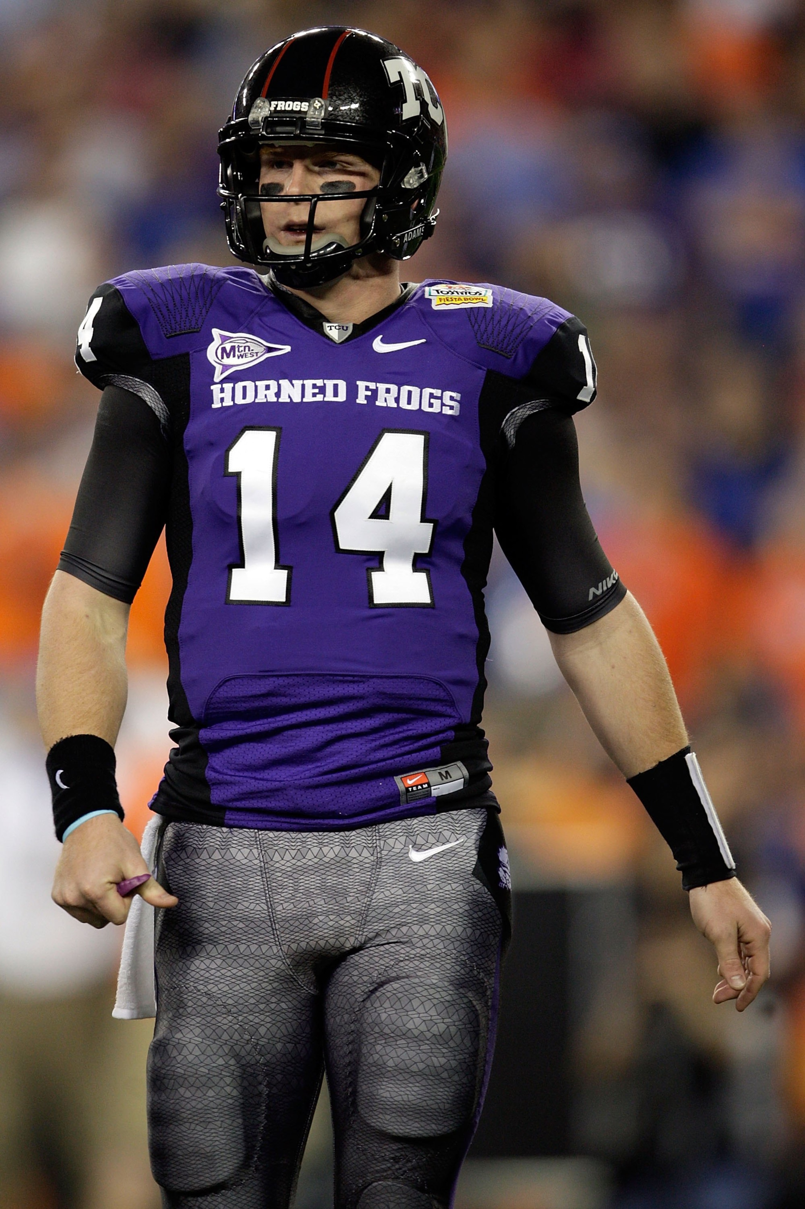 GLENDALE, AZ - JANUARY 04:  Quarterback Andy Dalton #14 of the TCU Horned Frogs looks on against the Boise State Broncos during the Tostitos Fiesta Bowl at the Universtity of Phoenix Stadium on January 4, 2010 in Glendale, Arizona.  (Photo by Jamie Squire
