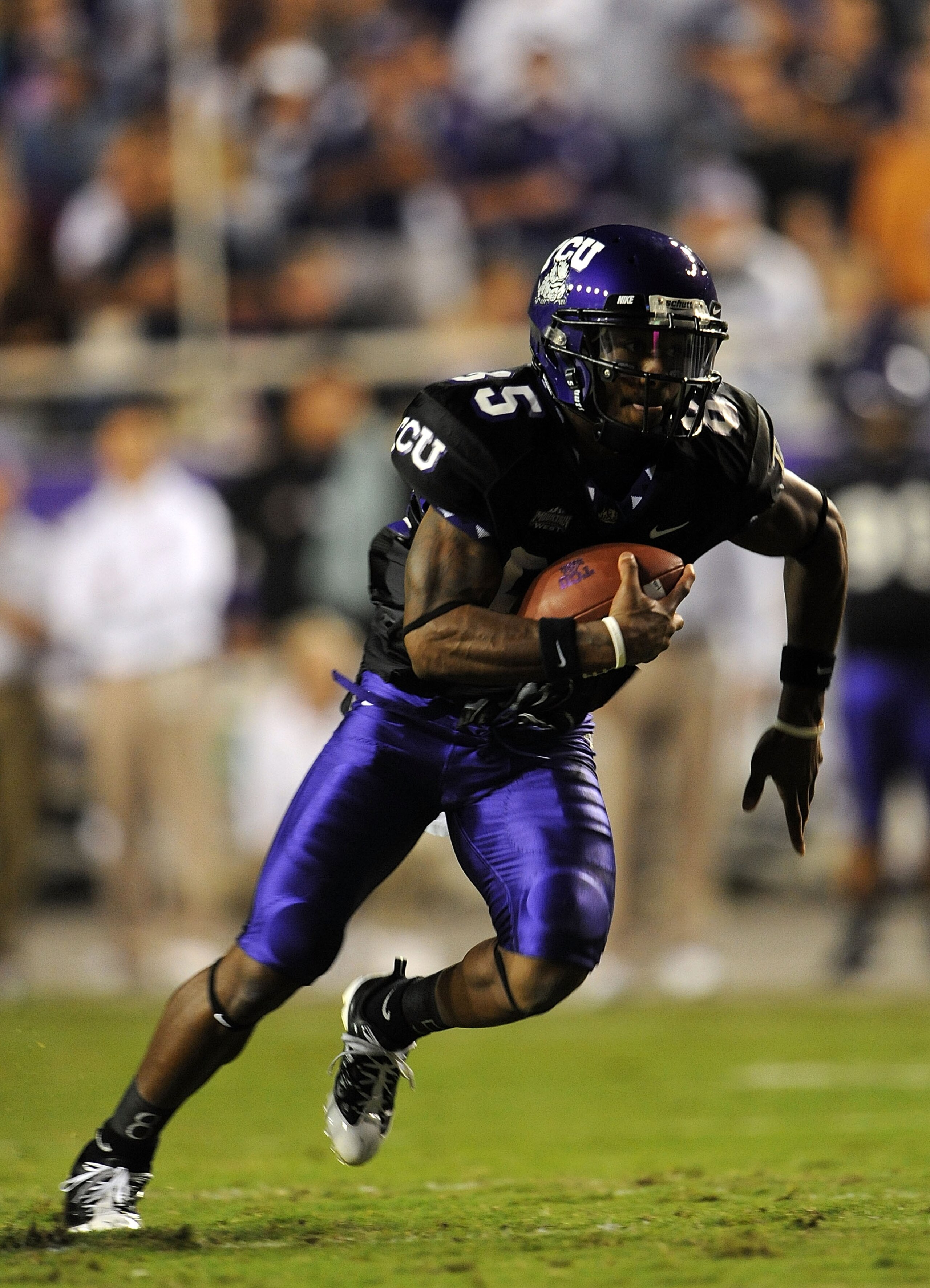 FORT WORTH, TX - OCTOBER 16:  Wide receiver Jeremy Kerley #85 of the TCU Horned Frogs runs for a touchdown in the first quarter at Amon G. Carter Stadium on October 16, 2008 in Fort Worth, Texas.  (Photo by Ronald Martinez/Getty Images)
