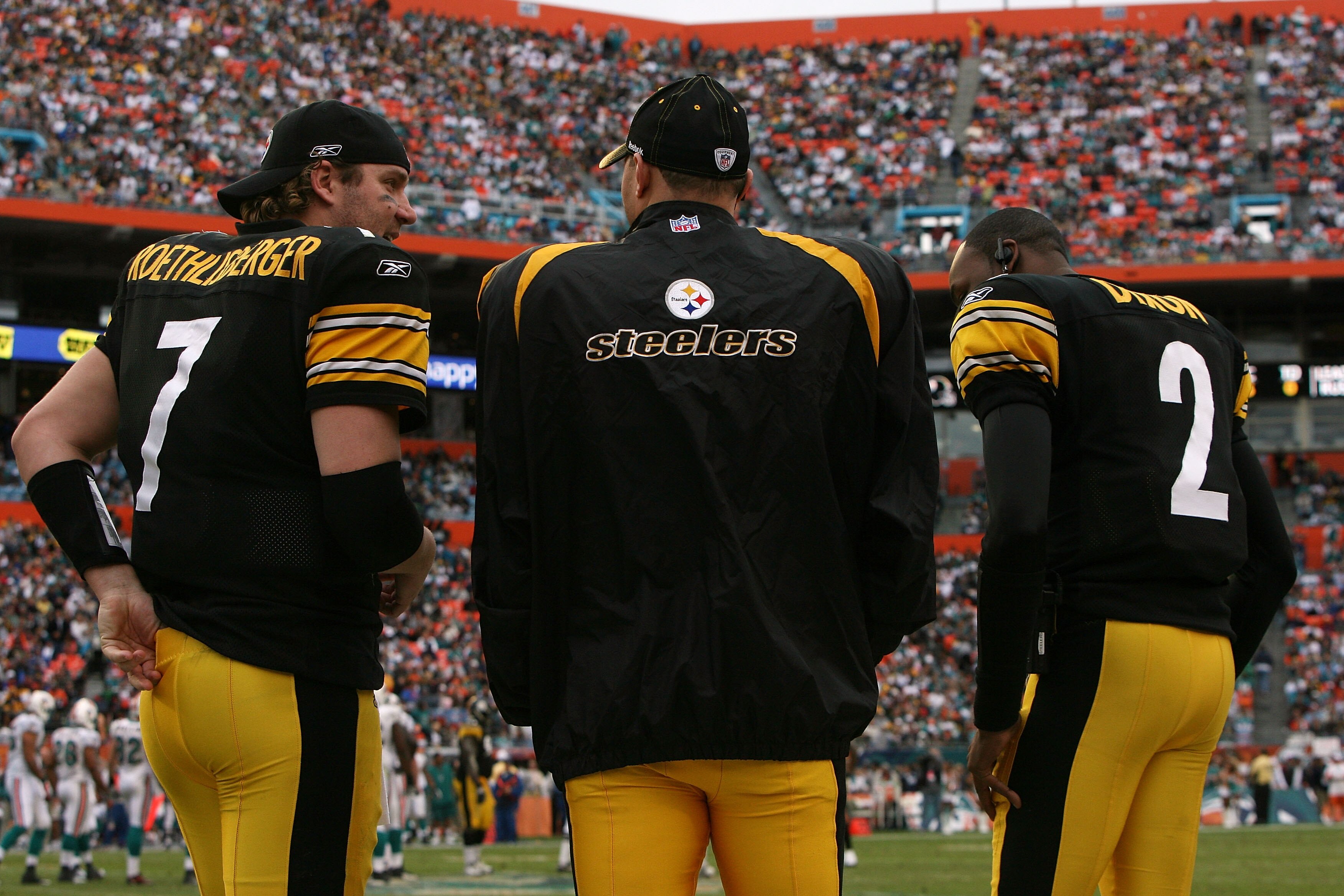 MIAMI - JANUARY 03:  Quarterbacks Ben Roethlisberger #7, Charlie Batch #16 and Dennis Dixon #2 of the Pittsburgh Steelers talk on the sidelines while taking on the Miami Dolphins at Land Shark Stadium on January 3, 2010 in Miami, Florida. The Steelers def